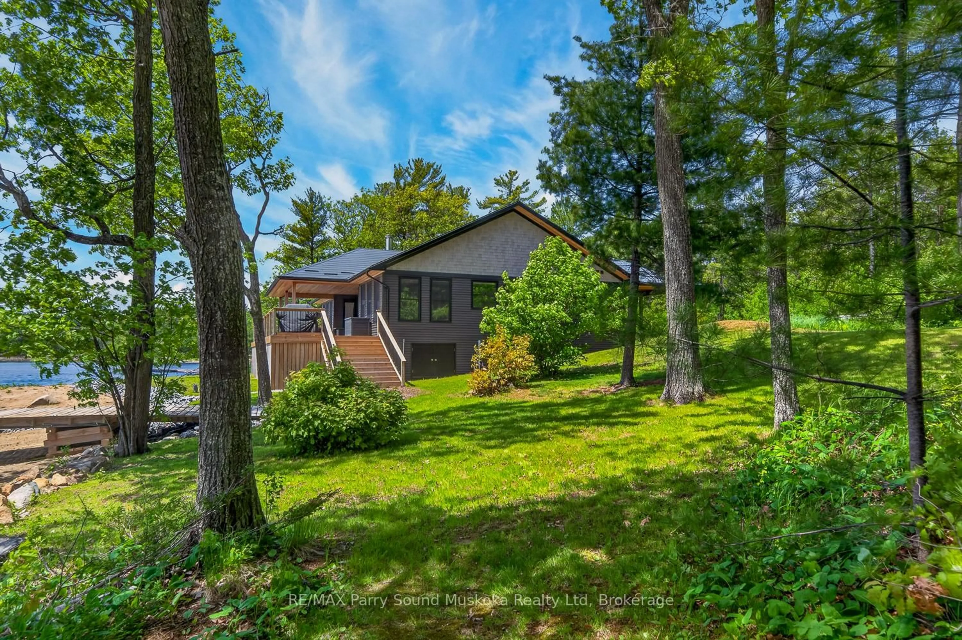 A pic from outside/outdoor area/front of a property/back of a property/a pic from drone, forest/trees view for 32 A11 Island, The Archipelago Ontario P0G 1K0