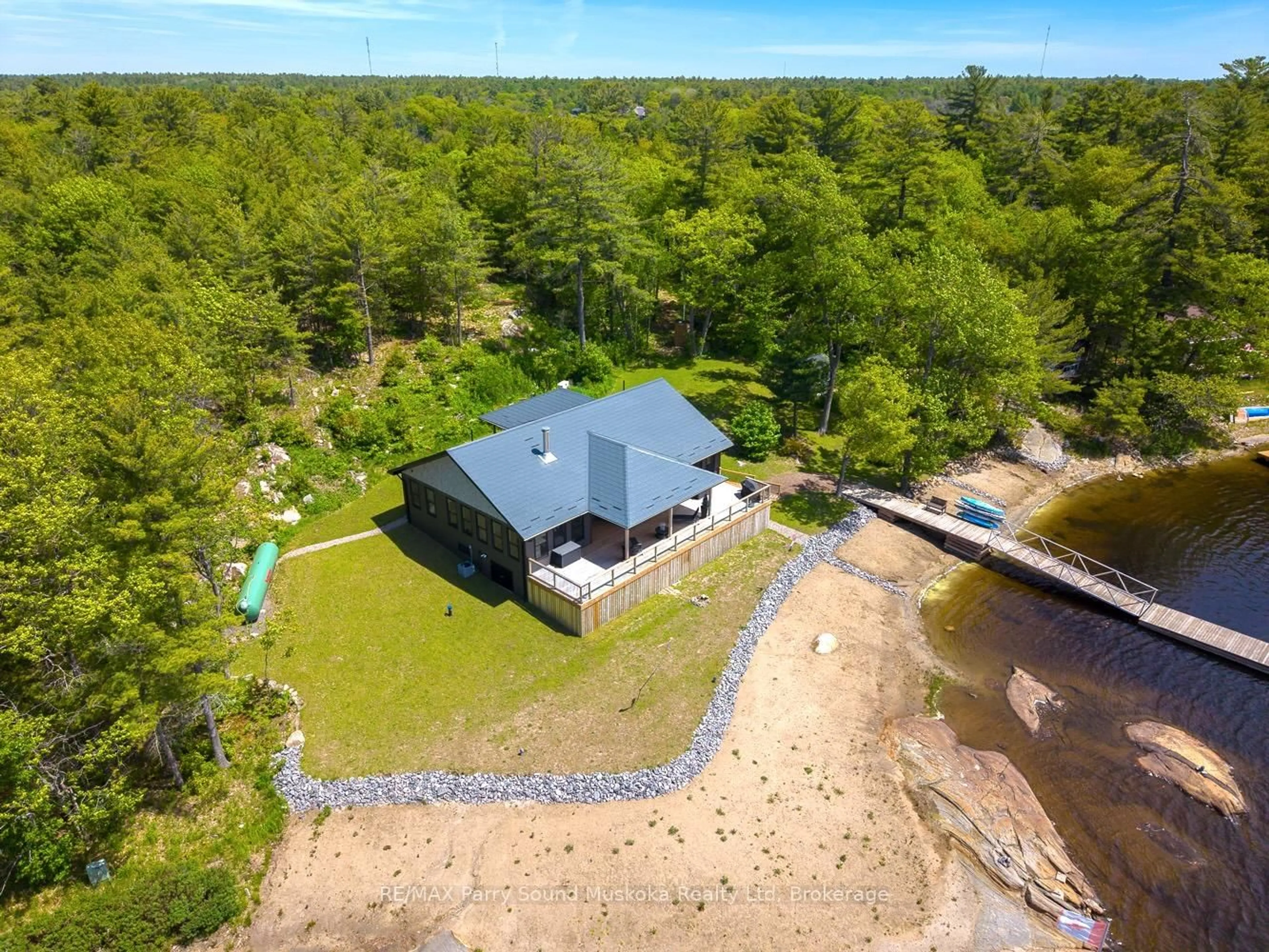 A pic from outside/outdoor area/front of a property/back of a property/a pic from drone, water/lake/river/ocean view for 32 A11 Island, The Archipelago Ontario P0G 1K0