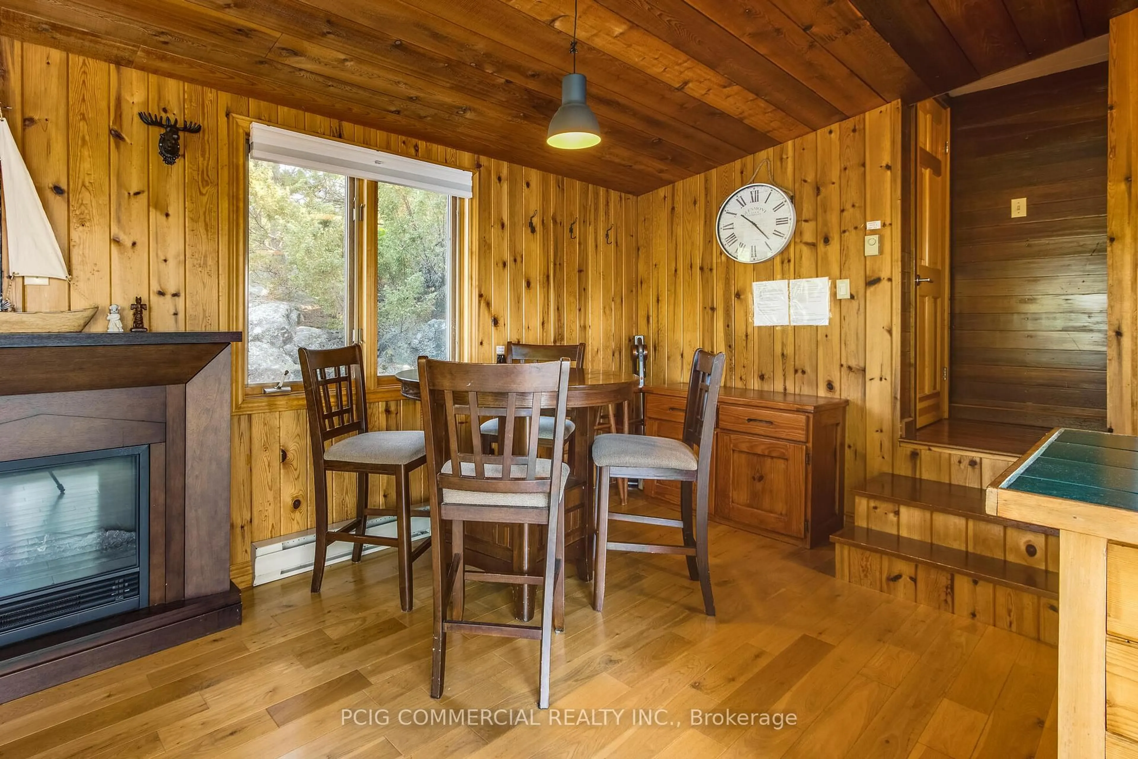Dining room, wood/laminate floor for 1518 Island 1040, Georgian Bay Ontario P0E 1E0