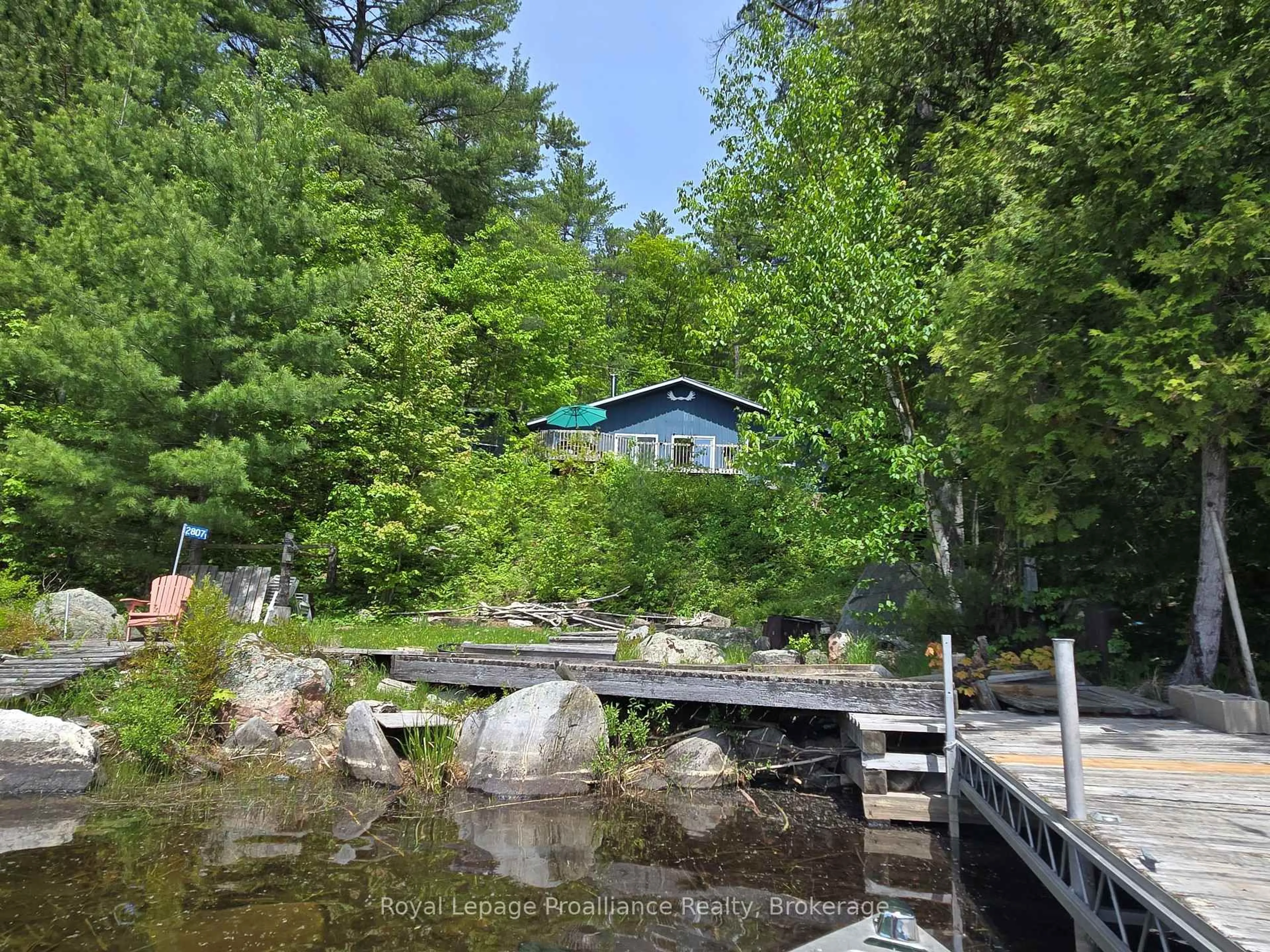A pic from outside/outdoor area/front of a property/back of a property/a pic from drone, water/lake/river/ocean view for 2807 Mackie Lake, Ompah Ontario K0H 2J0