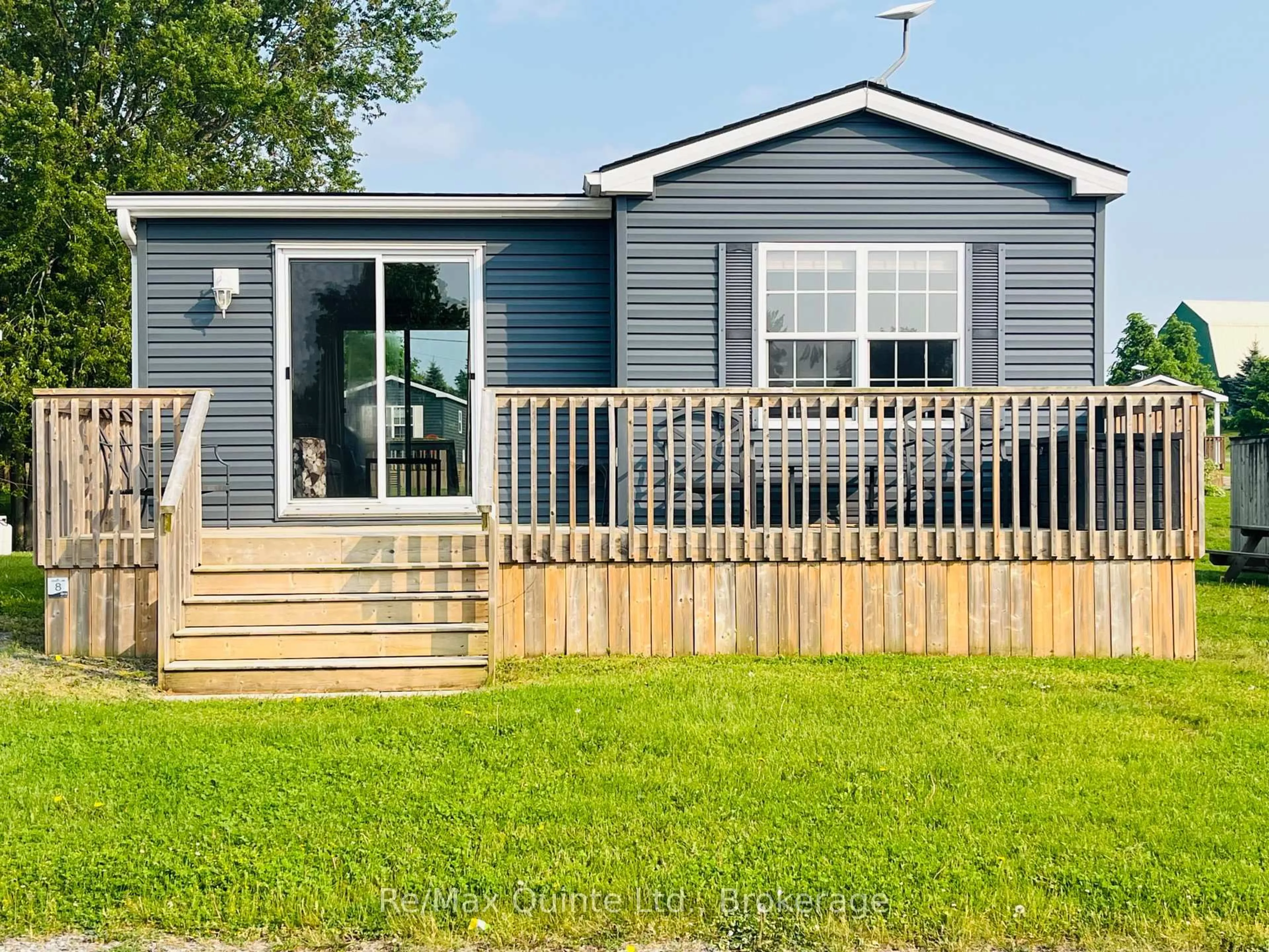 Home with vinyl exterior material, water/lake/river/ocean view for 486 County Road 18 #8 Cricket Ln, Prince Edward County Ontario K0K 1P0