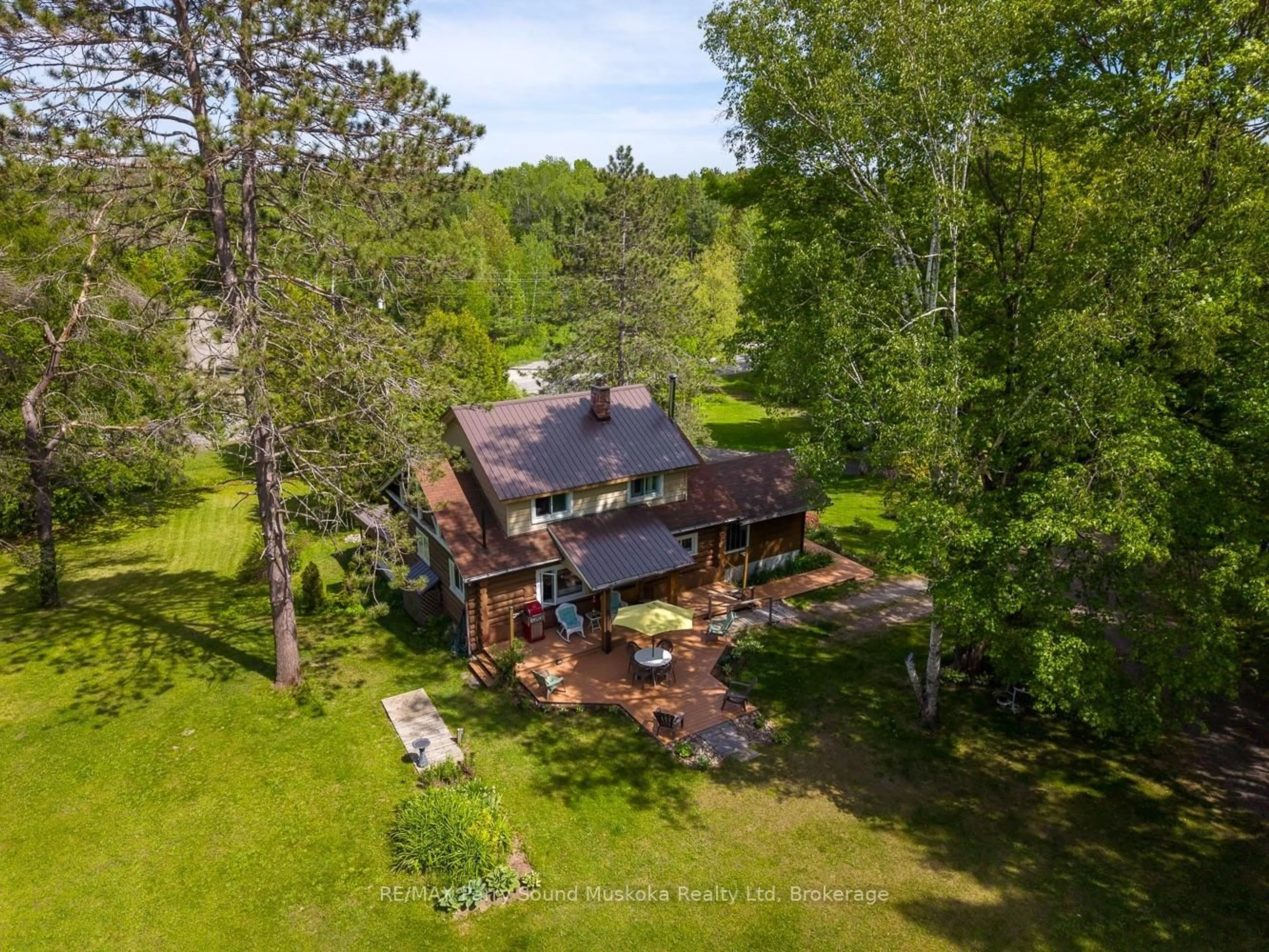 A pic from outside/outdoor area/front of a property/back of a property/a pic from drone, unknown for 203 Horseshoe Lake Rd, Seguin Ontario P2A 2W8