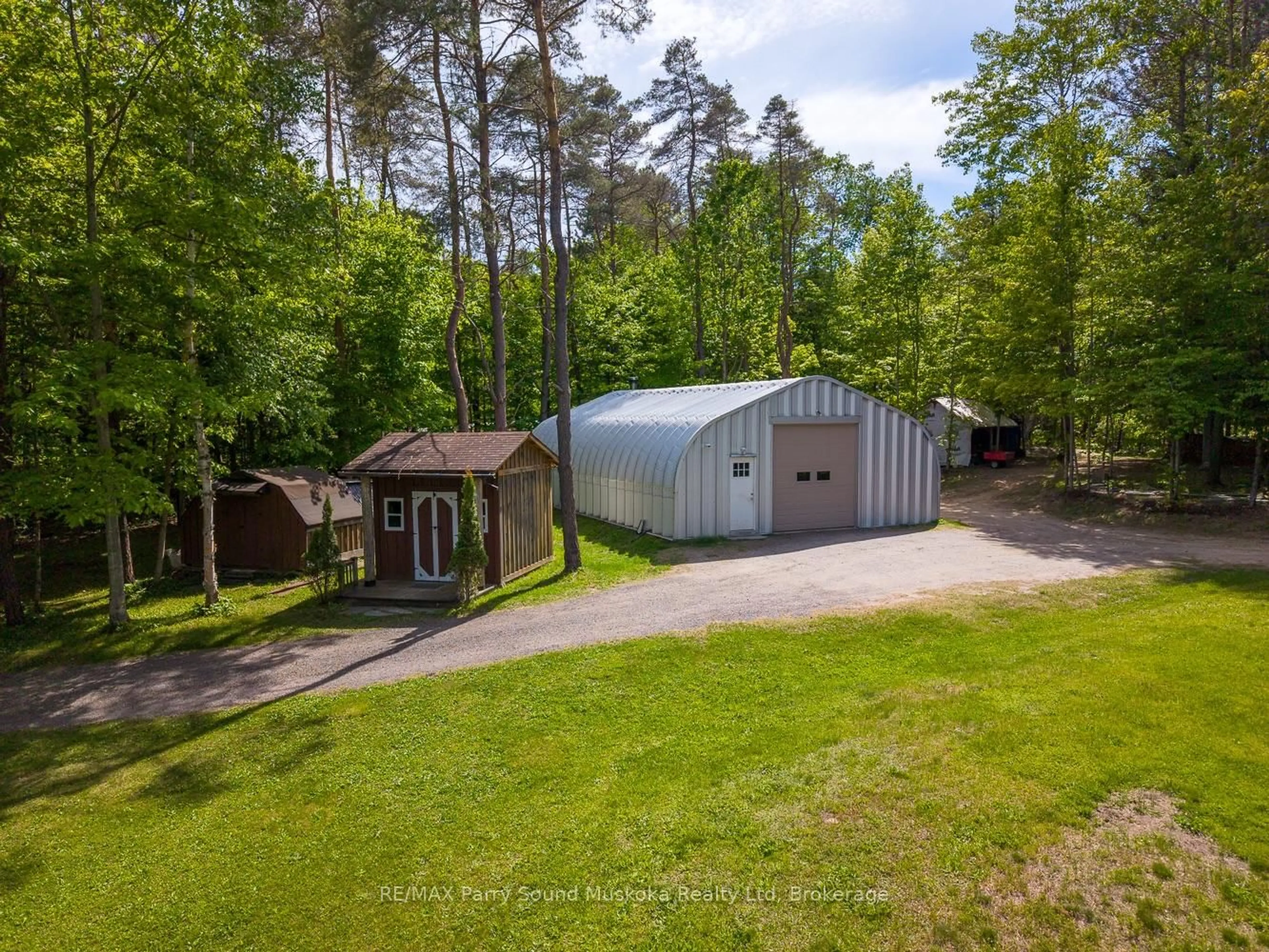 A pic from outside/outdoor area/front of a property/back of a property/a pic from drone, forest/trees view for 203 Horseshoe Lake Rd, Seguin Ontario P2A 2W8
