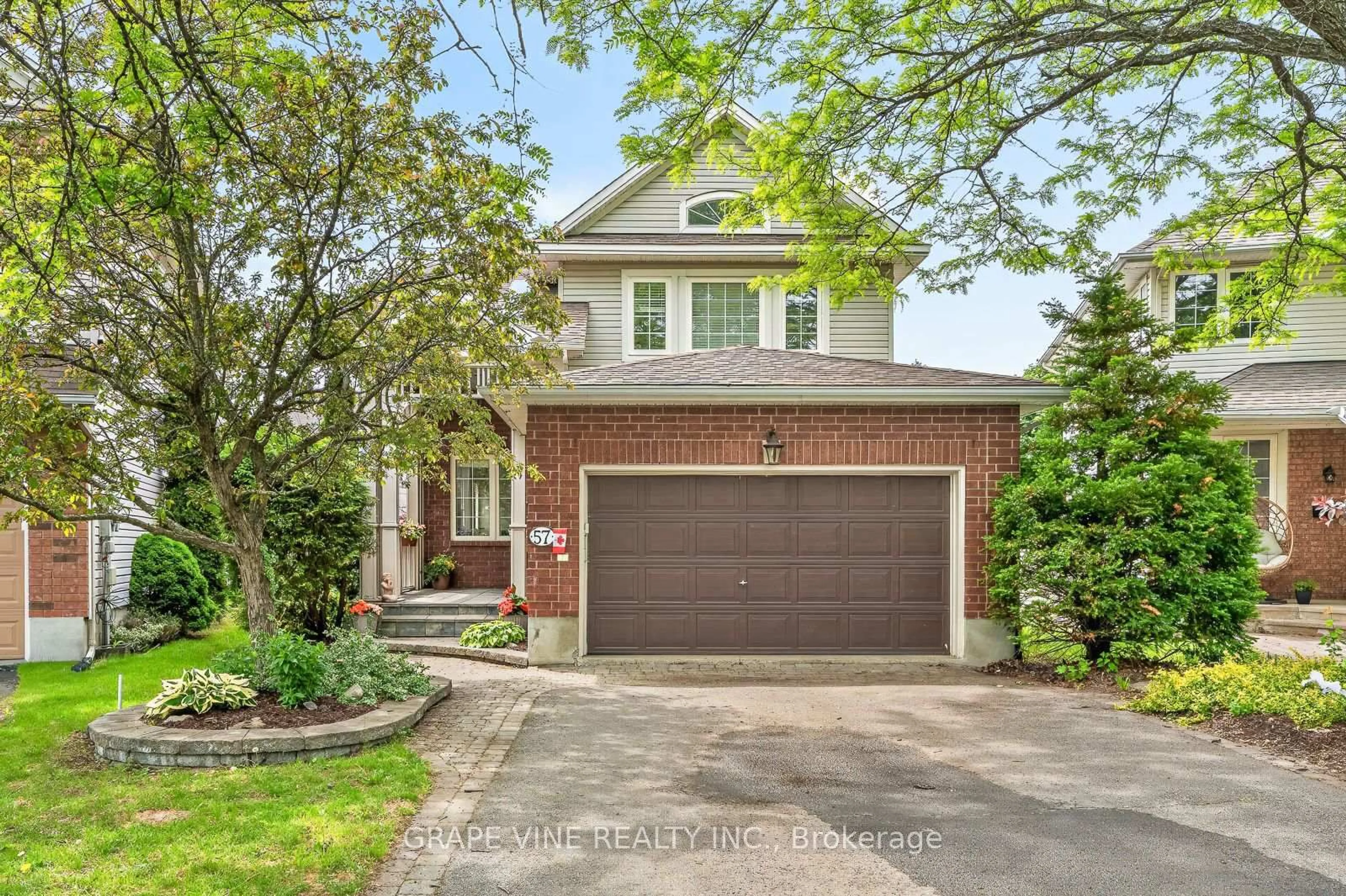 Home with brick exterior material, street for 57 Rivergreen Cres, Ottawa Ontario K2M 2W9