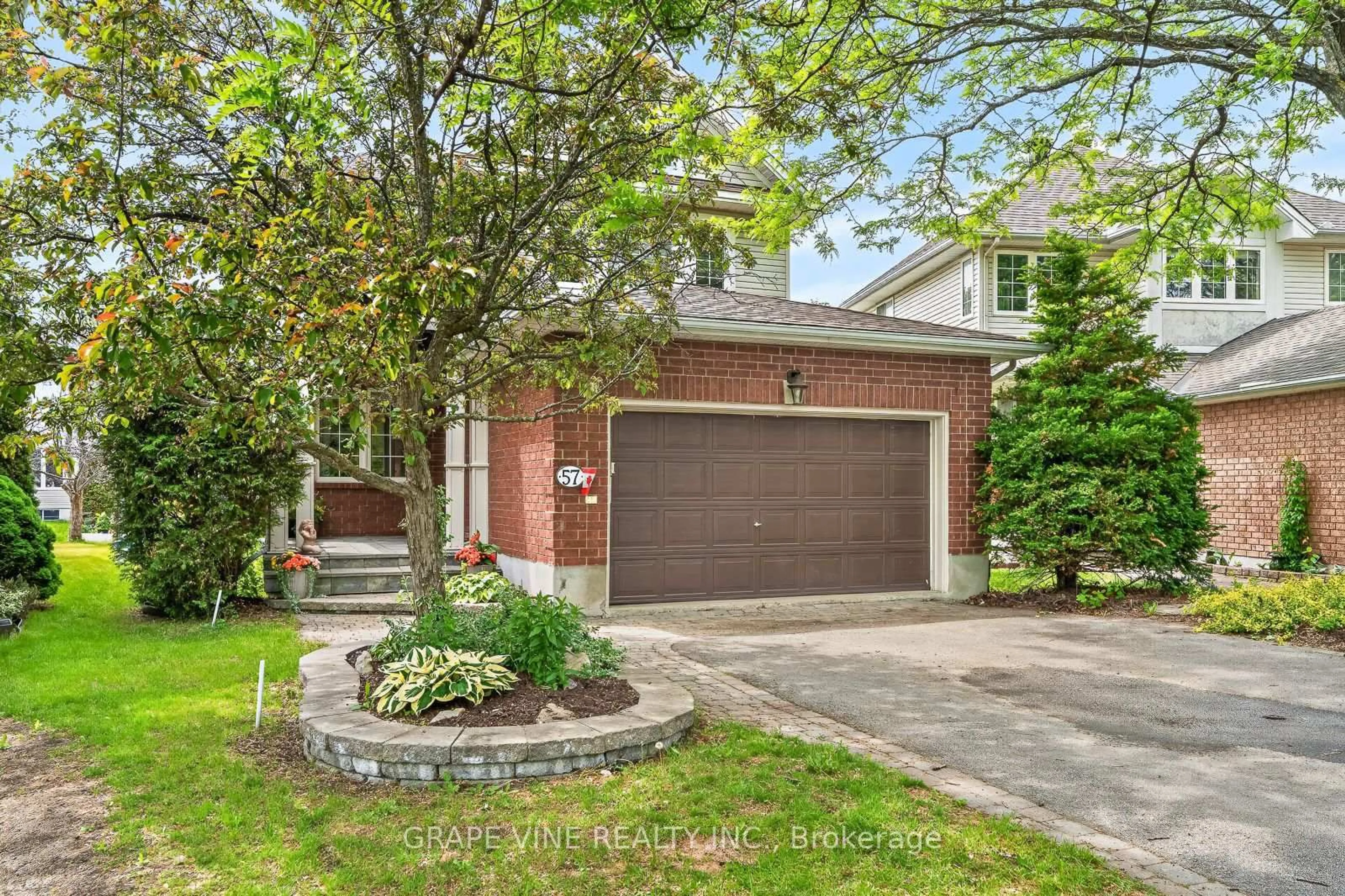 Home with brick exterior material, street for 57 Rivergreen Cres, Ottawa Ontario K2M 2W9