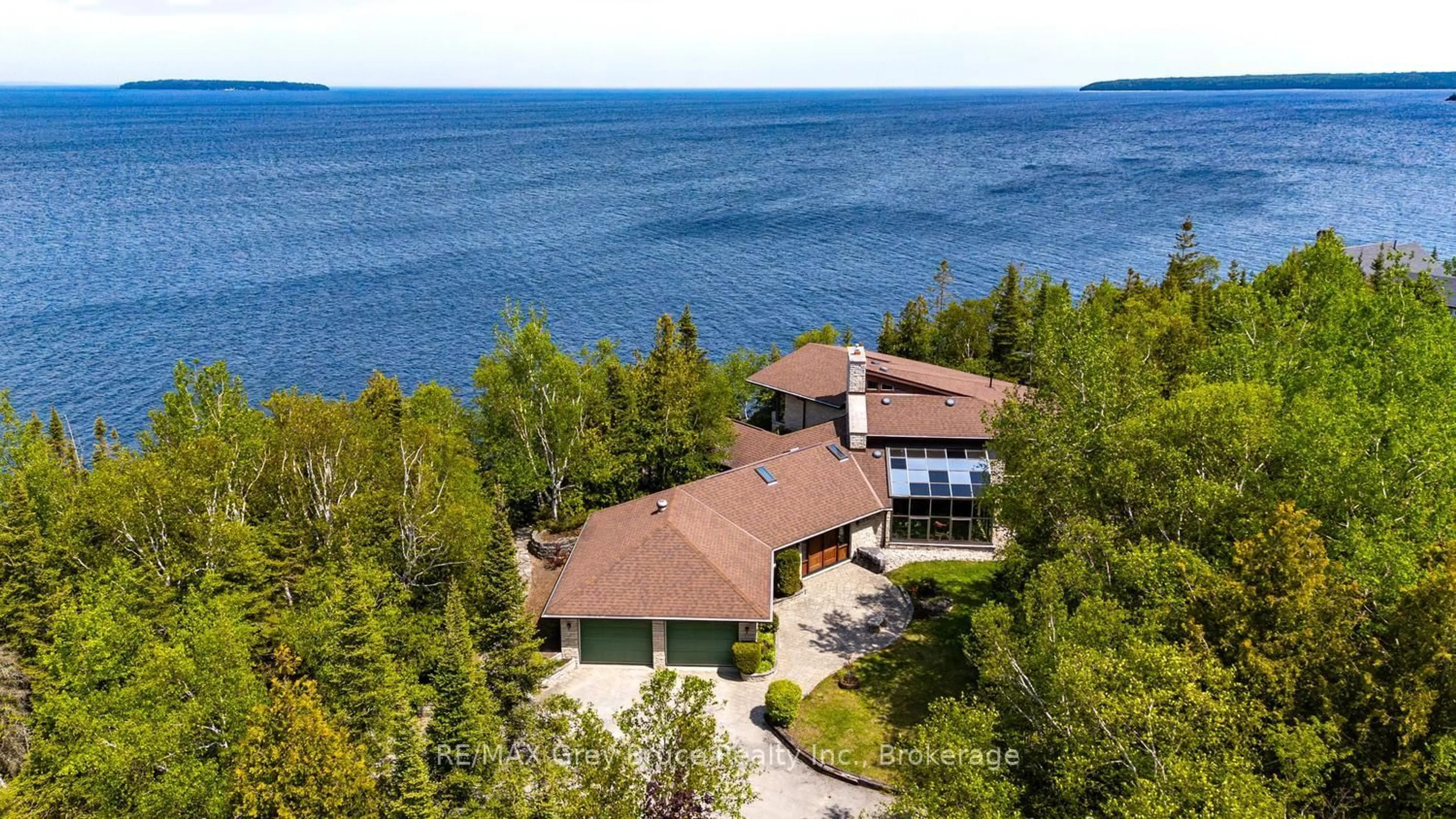 A pic from outside/outdoor area/front of a property/back of a property/a pic from drone, water/lake/river/ocean view for 28 Elgin St, Northern Bruce Peninsula Ontario N0H 2R0