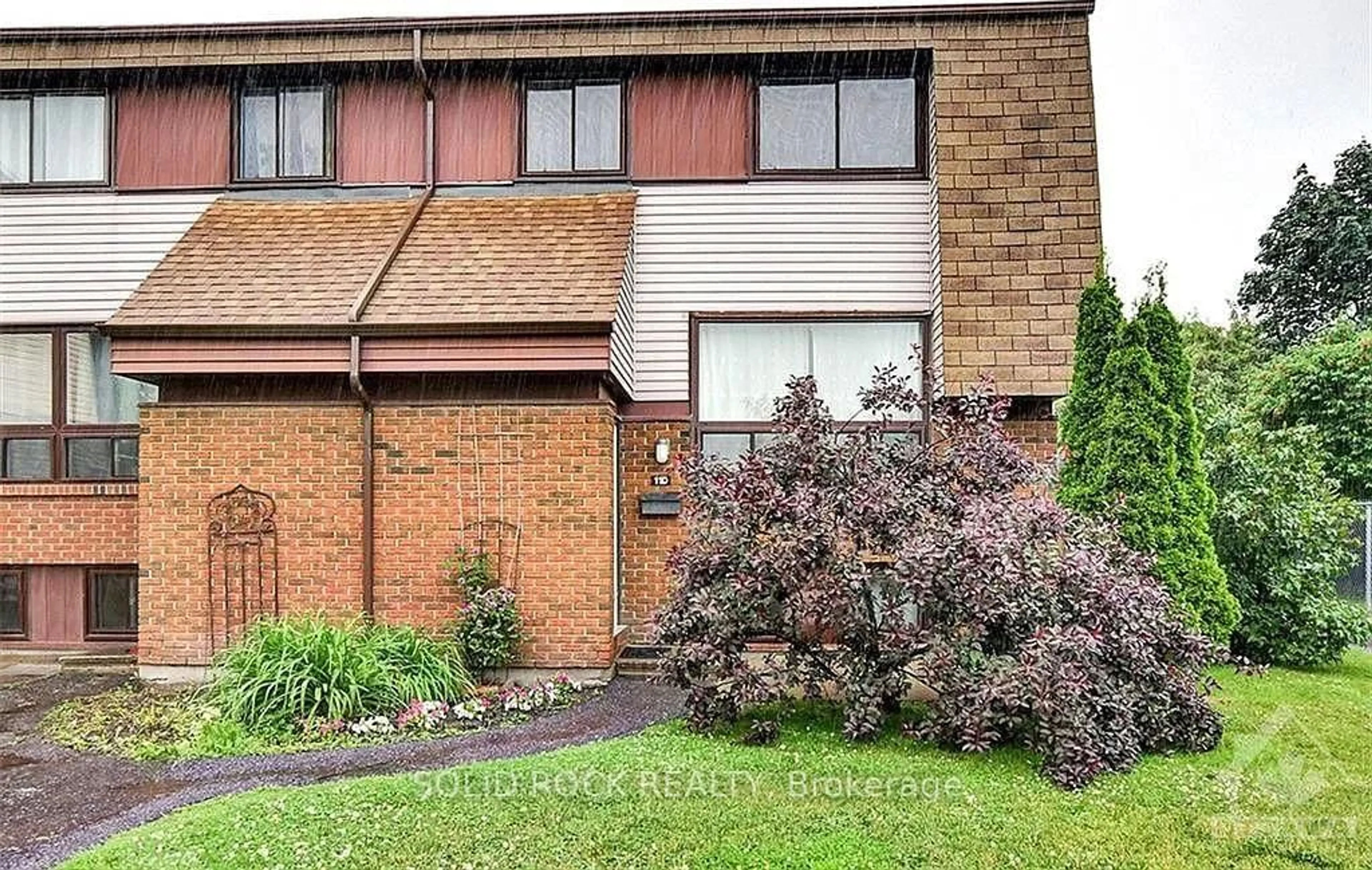 A pic from outside/outdoor area/front of a property/back of a property/a pic from drone, street for 11D Woodvale Green #D, Ottawa Ontario K2G 4G9