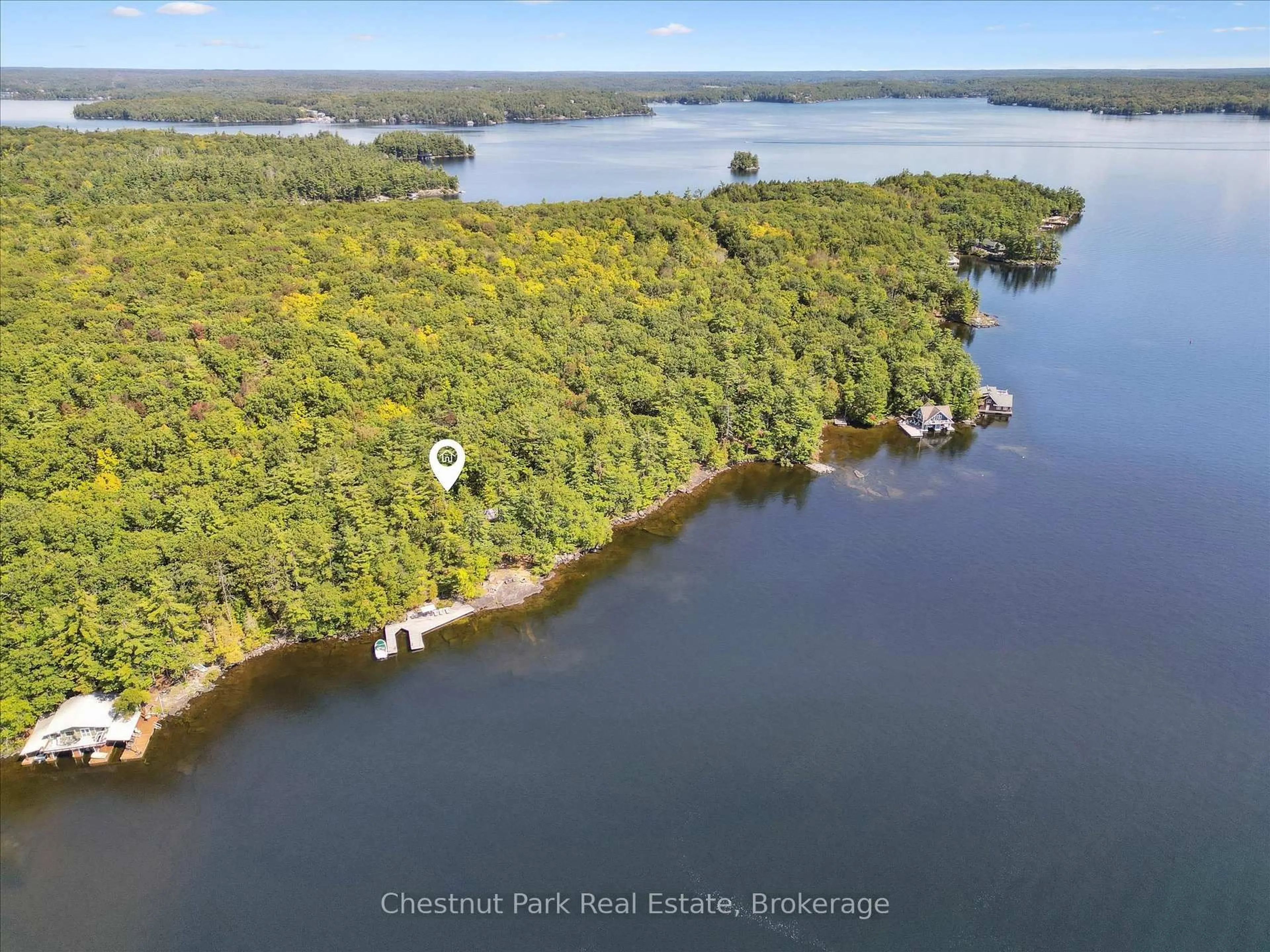 A pic from outside/outdoor area/front of a property/back of a property/a pic from drone, water/lake/river/ocean view for 982 Browning Island, Bracebridge Ontario P1L 1X2