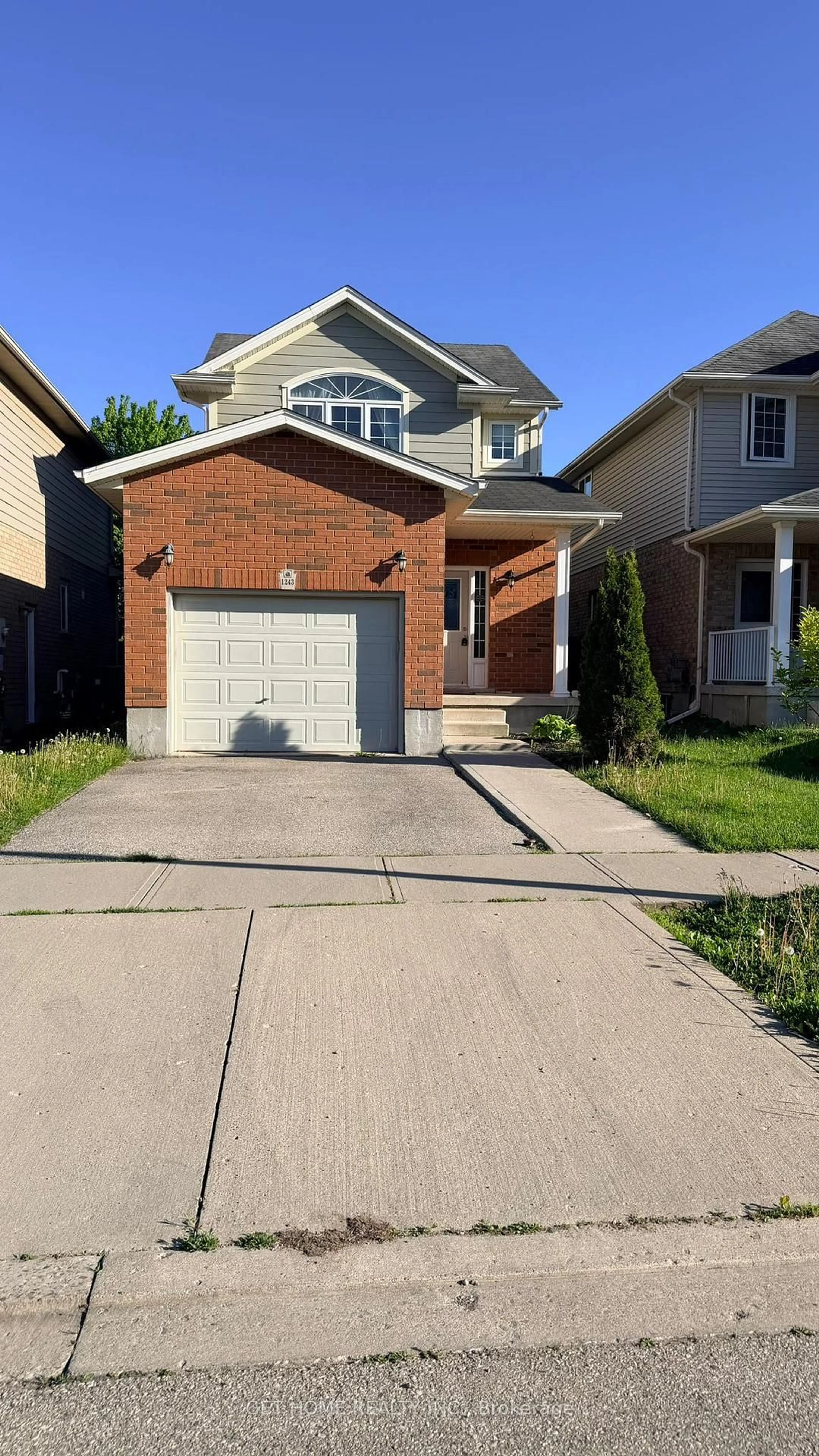 Home with brick exterior material, street for 1243 Old Zeller Dr, Kitchener Ontario N2A 0A2