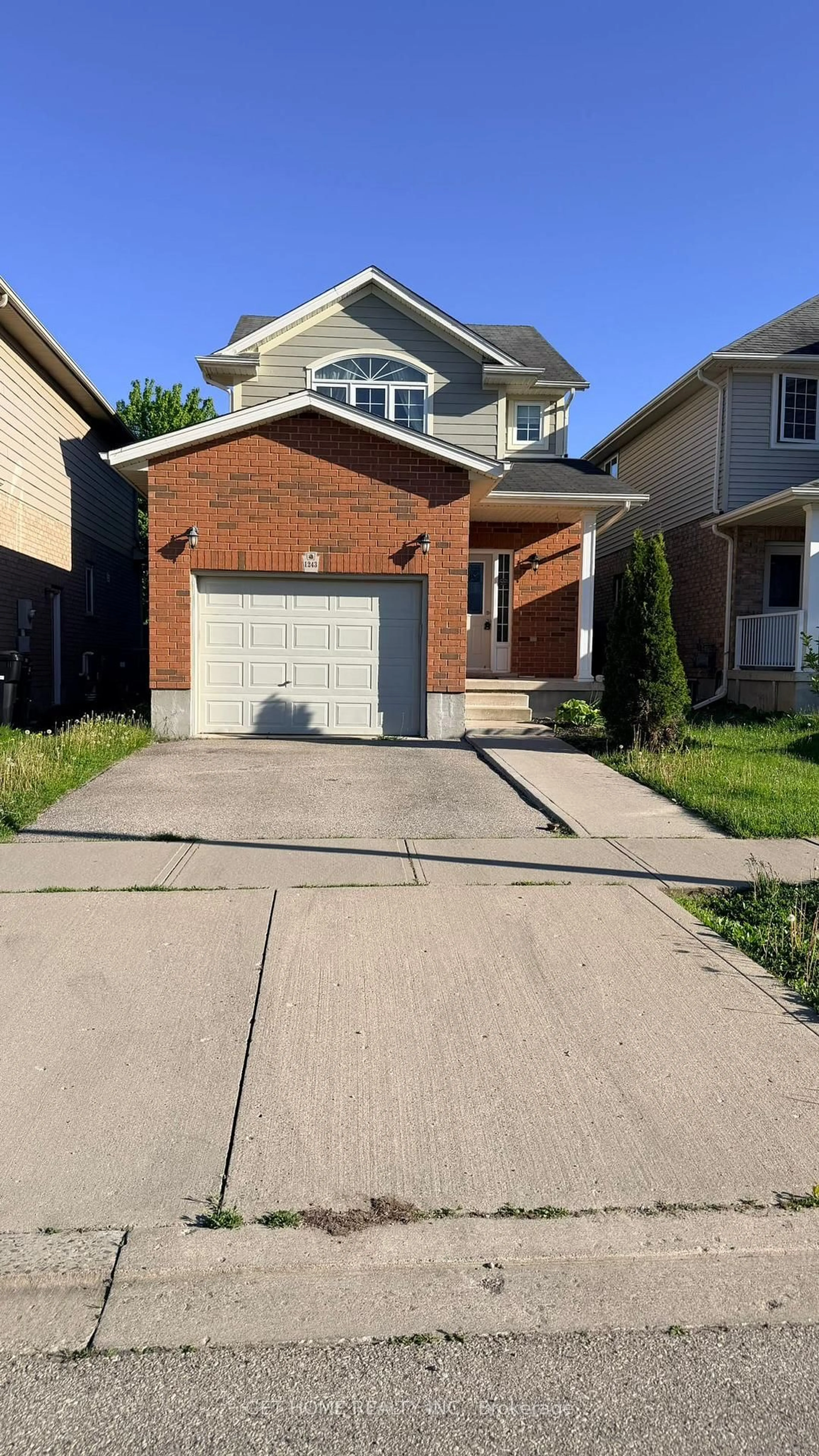 Home with brick exterior material, street for 1243 Old Zeller Dr, Kitchener Ontario N2A 0A2