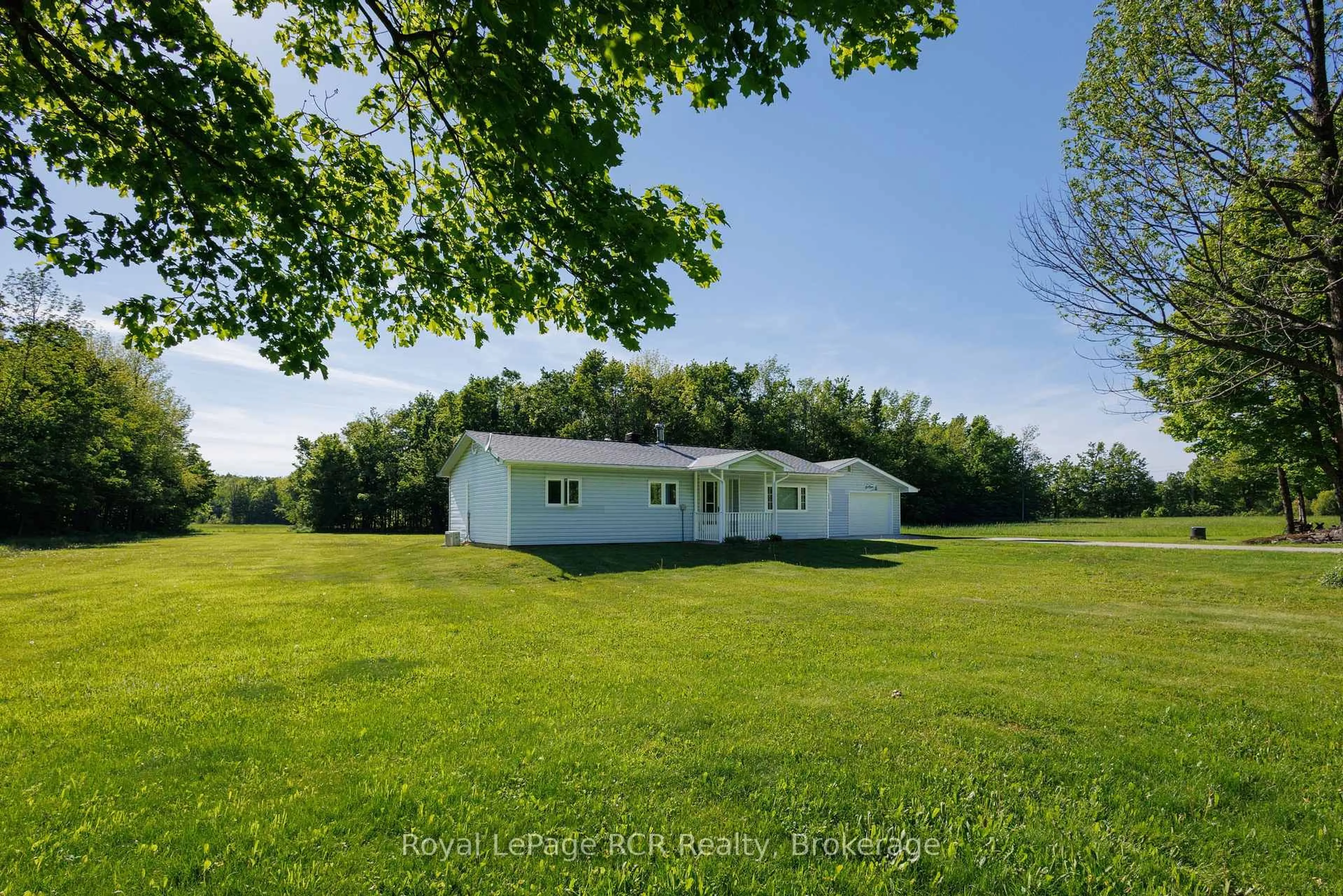 A pic from outside/outdoor area/front of a property/back of a property/a pic from drone, water/lake/river/ocean view for 310420 Kemble Rock Rd, Georgian Bluffs Ontario N0H 2T0
