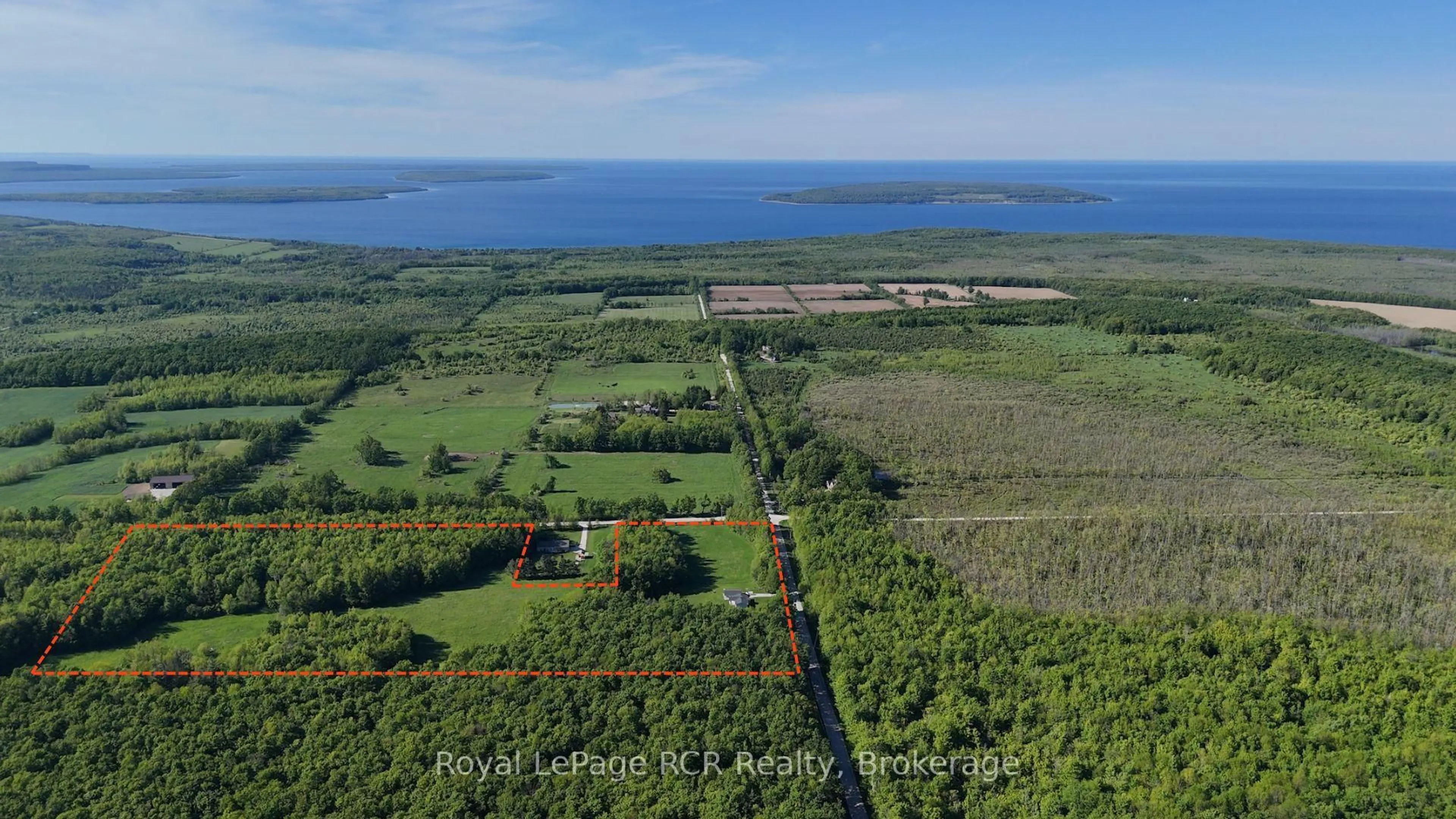 A pic from outside/outdoor area/front of a property/back of a property/a pic from drone, water/lake/river/ocean view for 310420 Kemble Rock Rd, Georgian Bluffs Ontario N0H 2T0