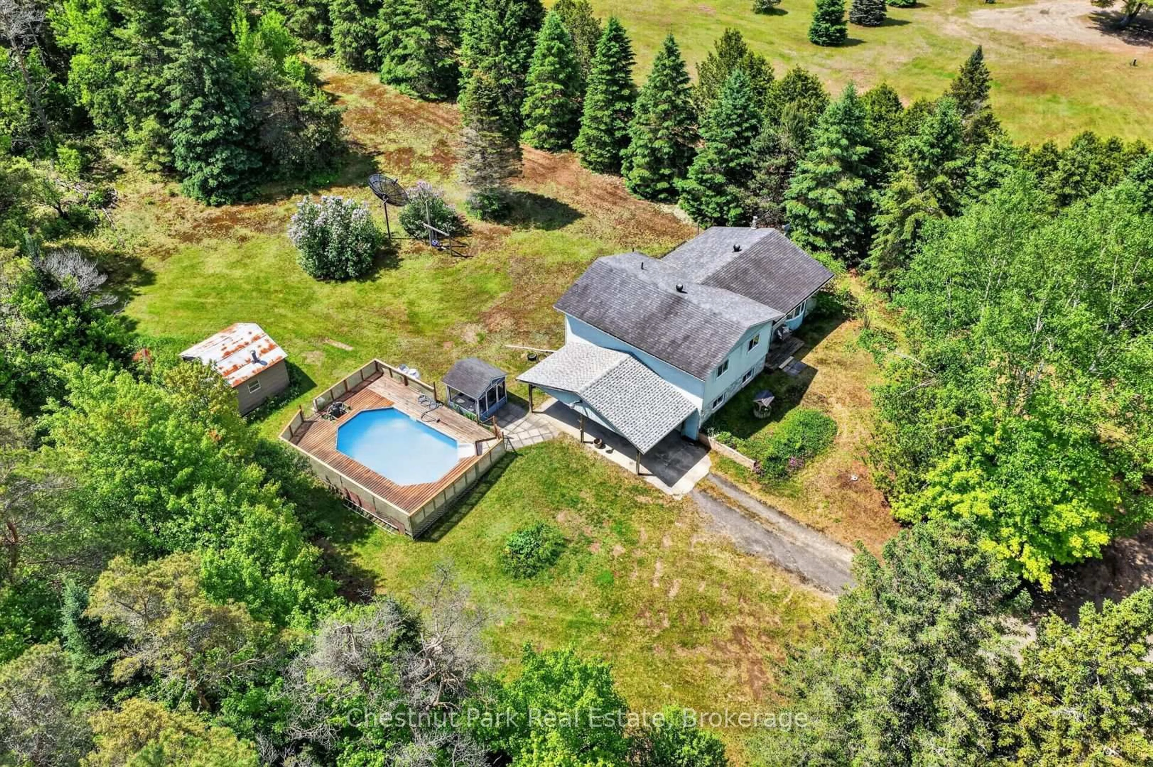 A pic from outside/outdoor area/front of a property/back of a property/a pic from drone, water/lake/river/ocean view for 41 Hawthorn Lane, Huntsville Ontario P1H 2N5