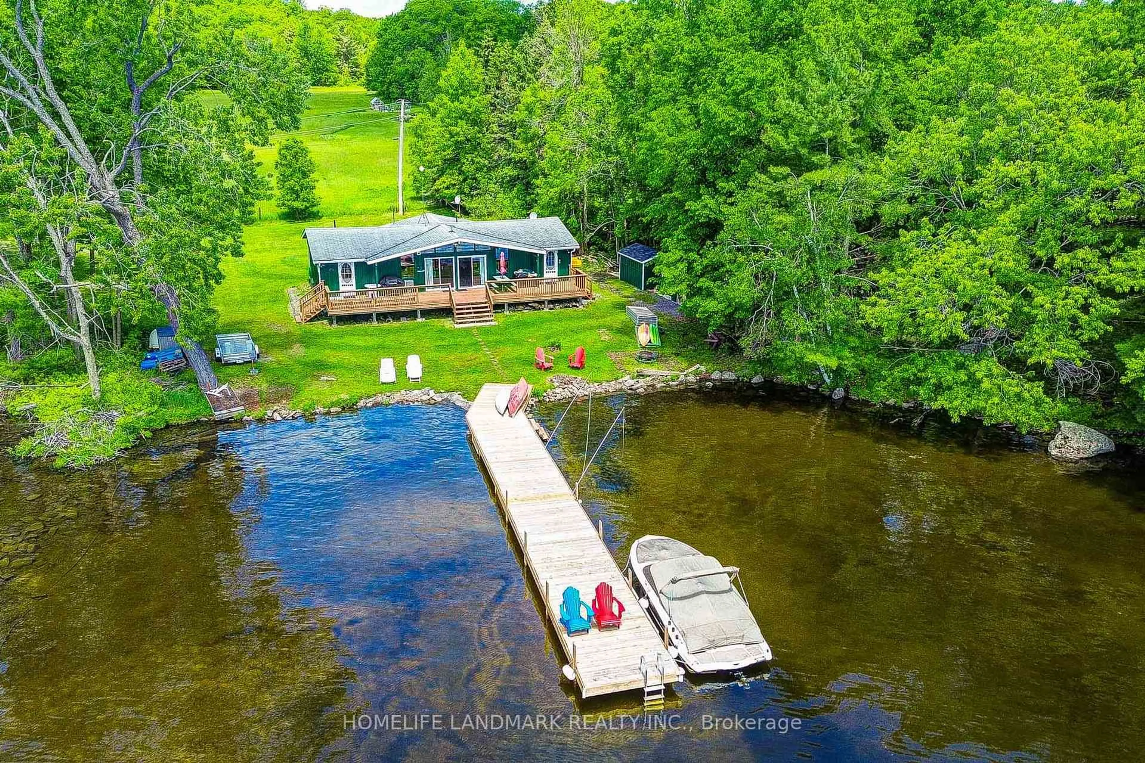 A pic from outside/outdoor area/front of a property/back of a property/a pic from drone, water/lake/river/ocean view for 1093 Cooper Point Rd #8, Muskoka Lakes Ontario ON P0B 1J0