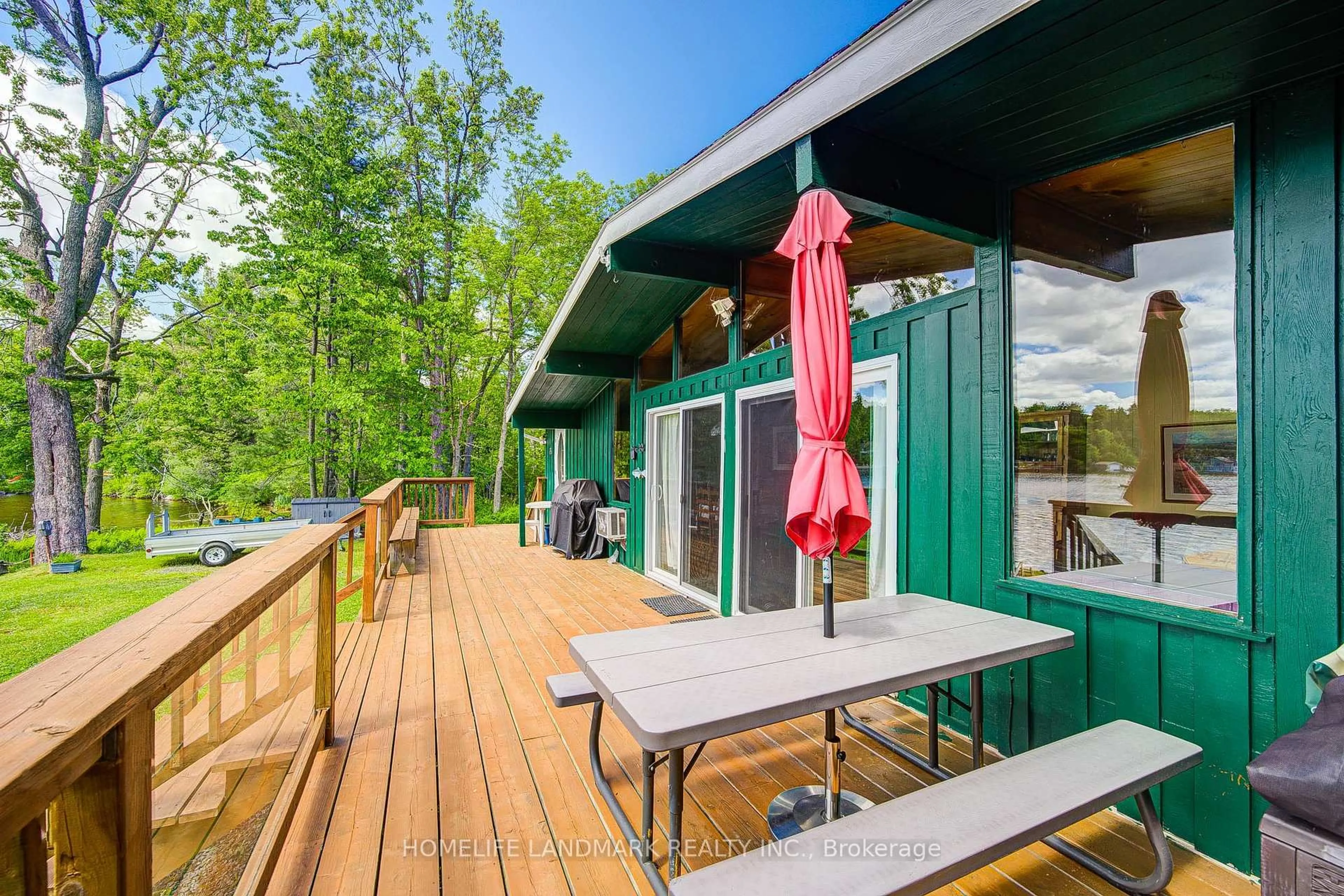 Patio, water/lake/river/ocean view for 1093 Cooper Point Rd #8, Muskoka Lakes Ontario ON P0B 1J0