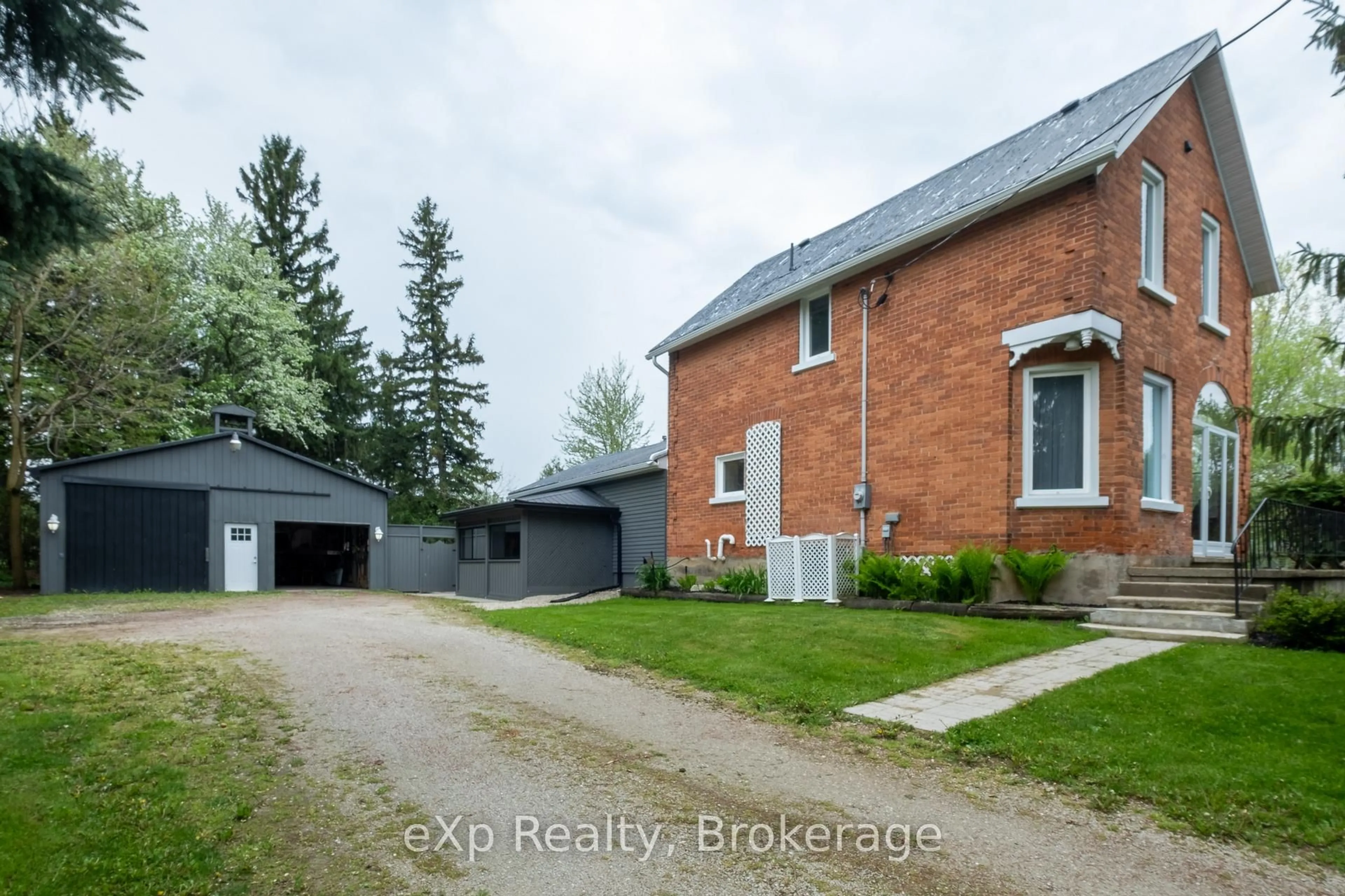 A pic from outside/outdoor area/front of a property/back of a property/a pic from drone, street for 046296 Old Mail Rd, Meaford Ontario N4L 1W7