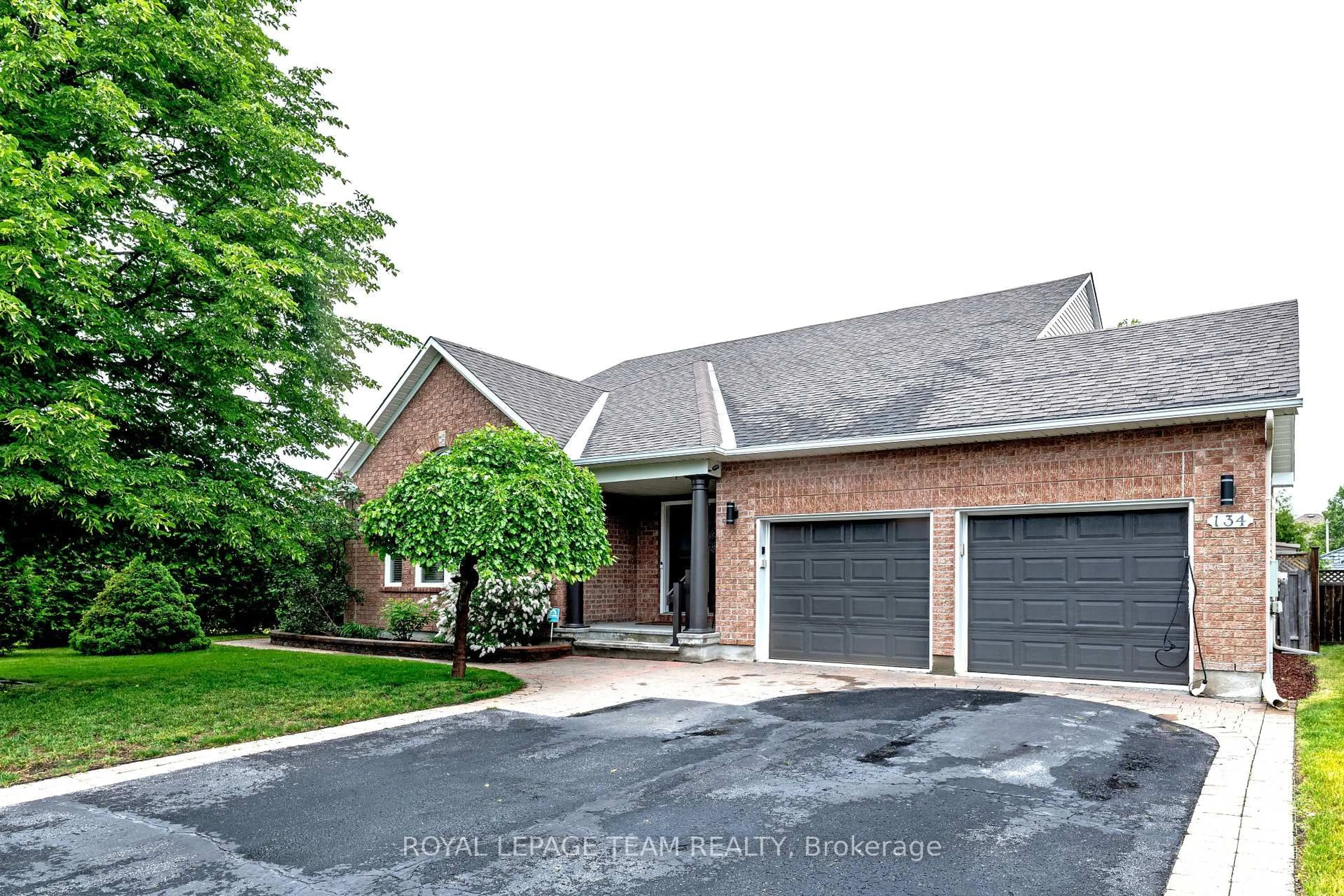 Home with brick exterior material, street for 134 Coursier Cres, Orleans Ontario K4A 4N5