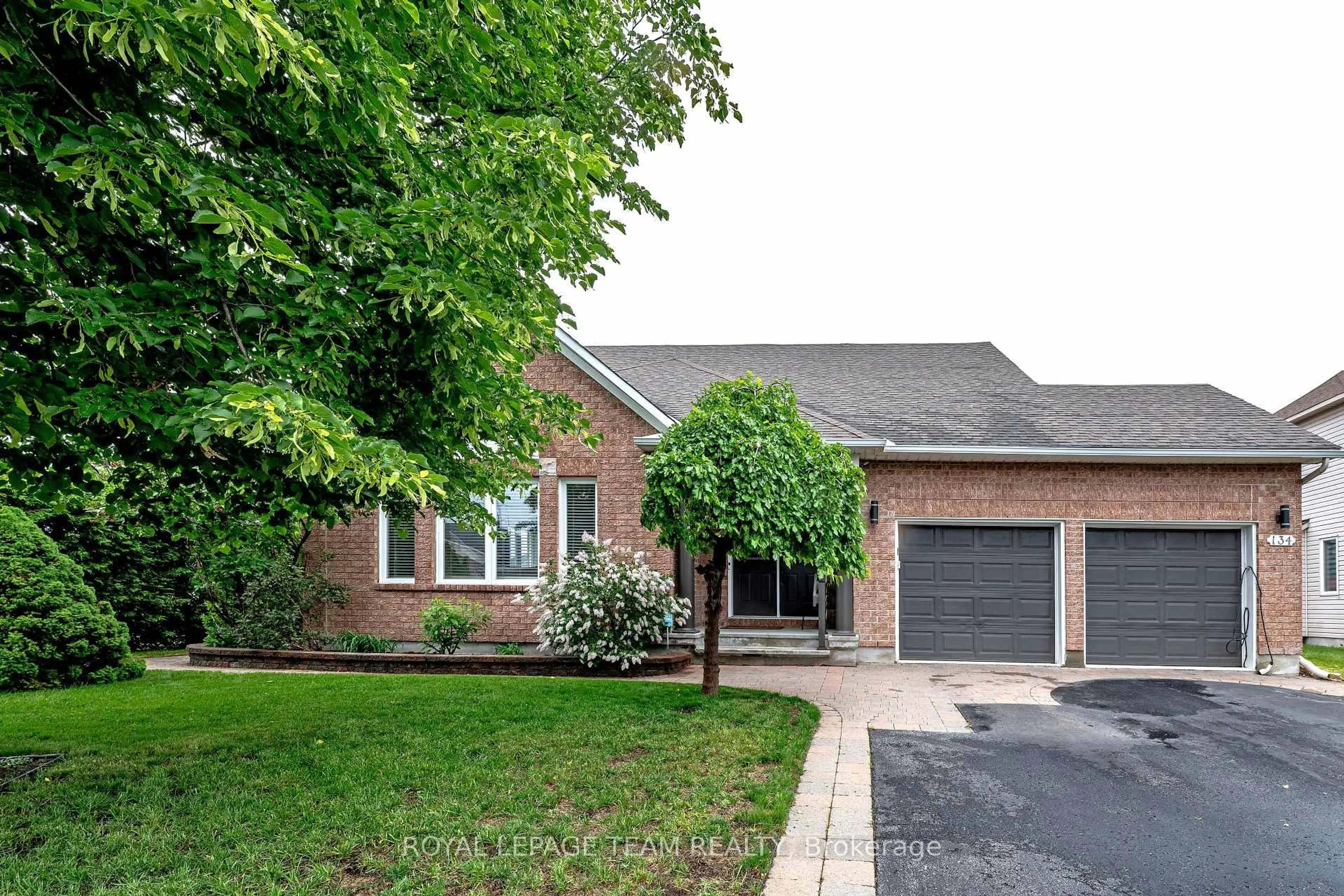 Home with brick exterior material, street for 134 Coursier Cres, Orleans Ontario K4A 4N5