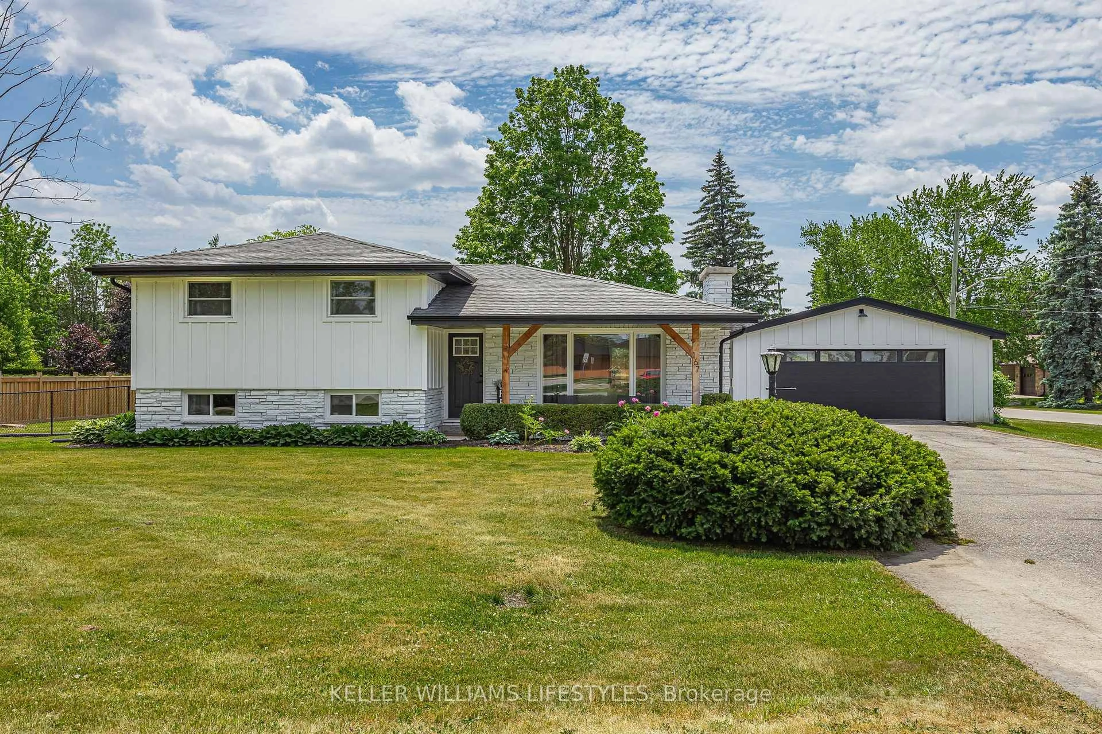 Home with vinyl exterior material, street for 167 Mcleod St, North Middlesex Ontario N0M 2K0