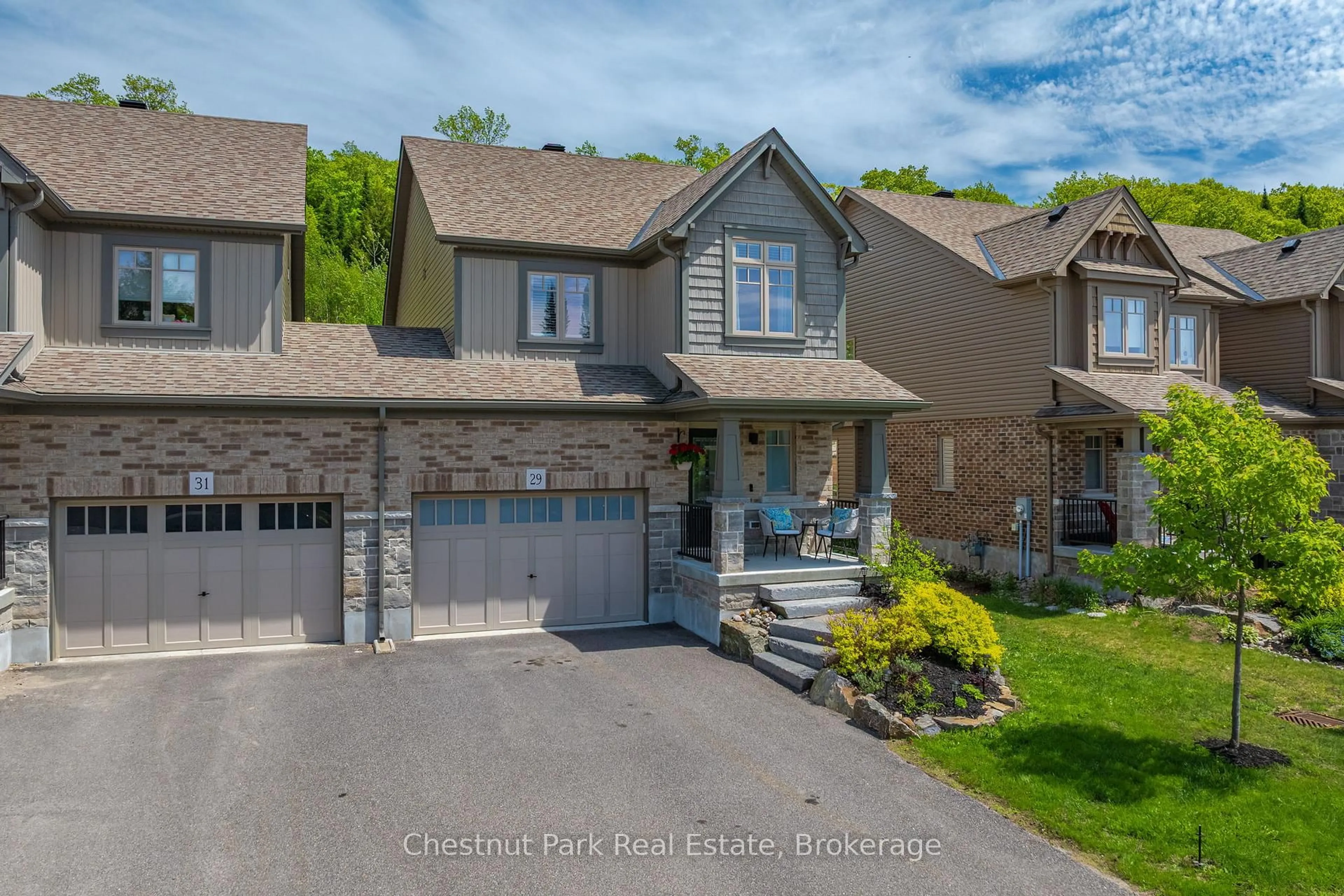 A pic from outside/outdoor area/front of a property/back of a property/a pic from drone, street for 29 Kelsey Madison Crt, Huntsville Ontario P1H 1C8