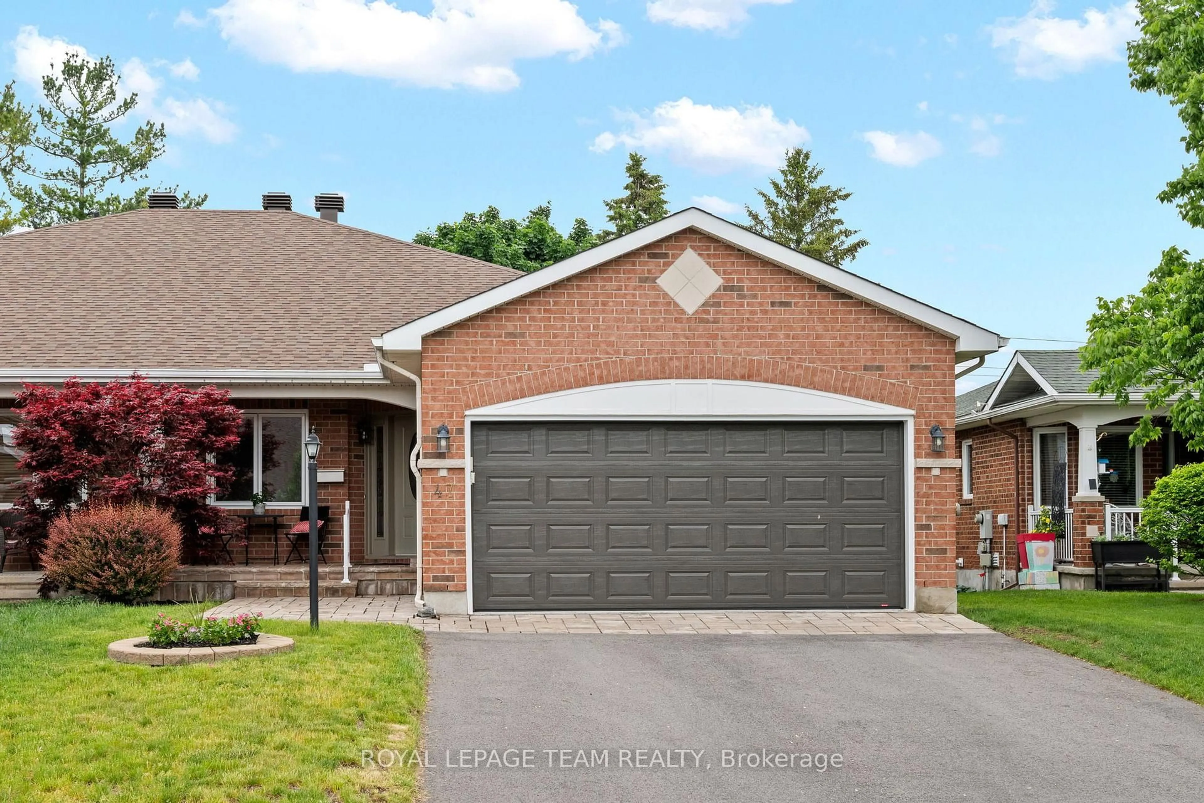 Home with brick exterior material, street for 47 Stowgrass Cres, Stittsville Ontario K2S 2A1