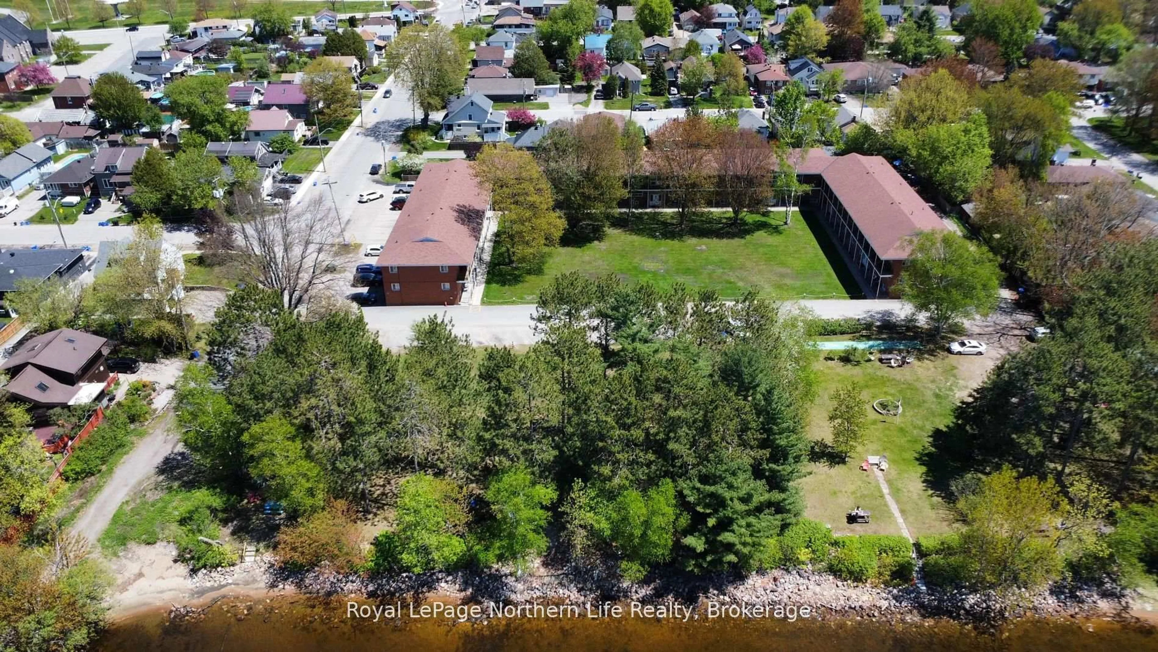 A pic from outside/outdoor area/front of a property/back of a property/a pic from drone, water/lake/river/ocean view for 40 Judge Ave #25, North Bay Ontario P1A 1B4