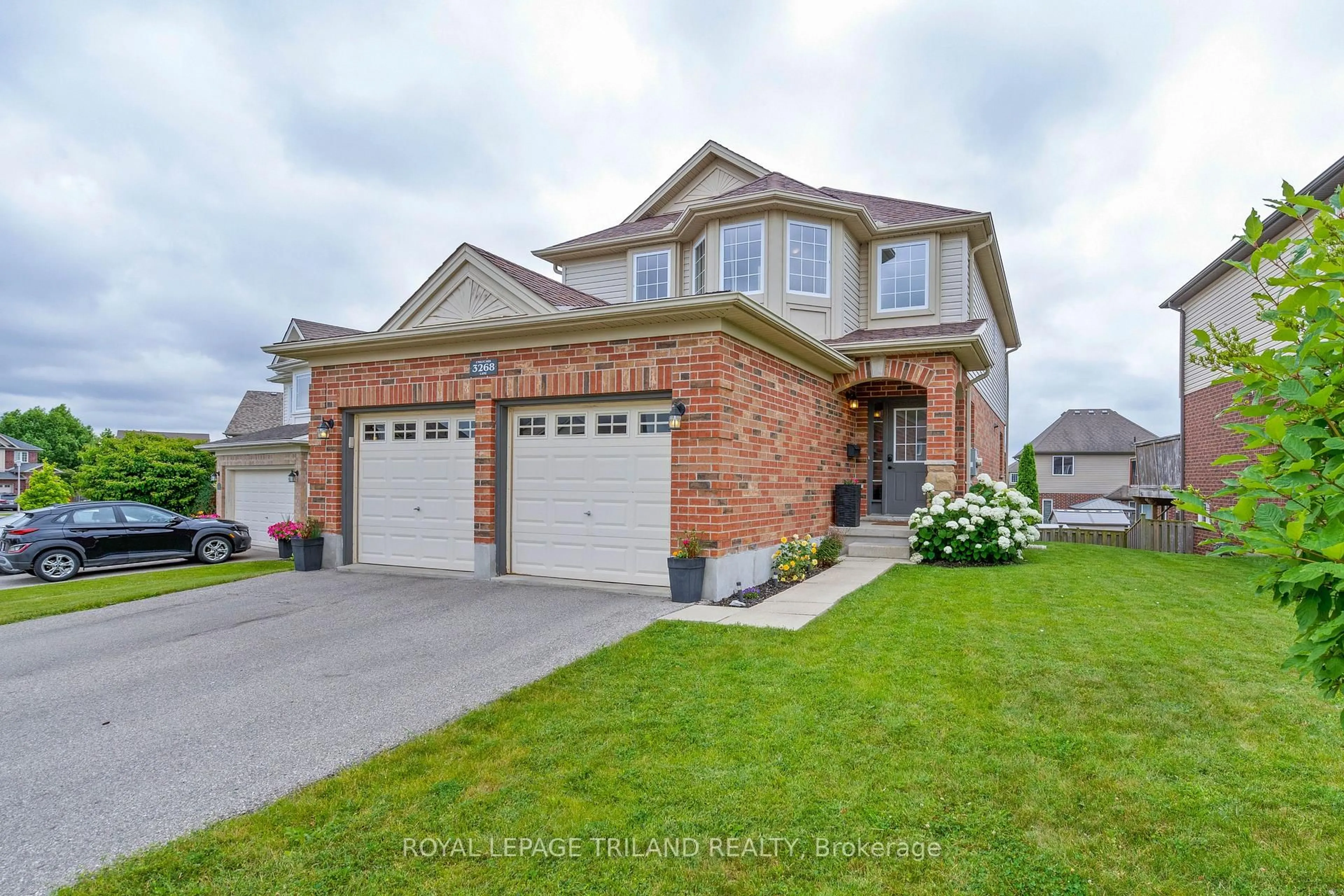 Home with brick exterior material, street for 3268 Emilycarr Lane, London South Ontario N6L 0B2