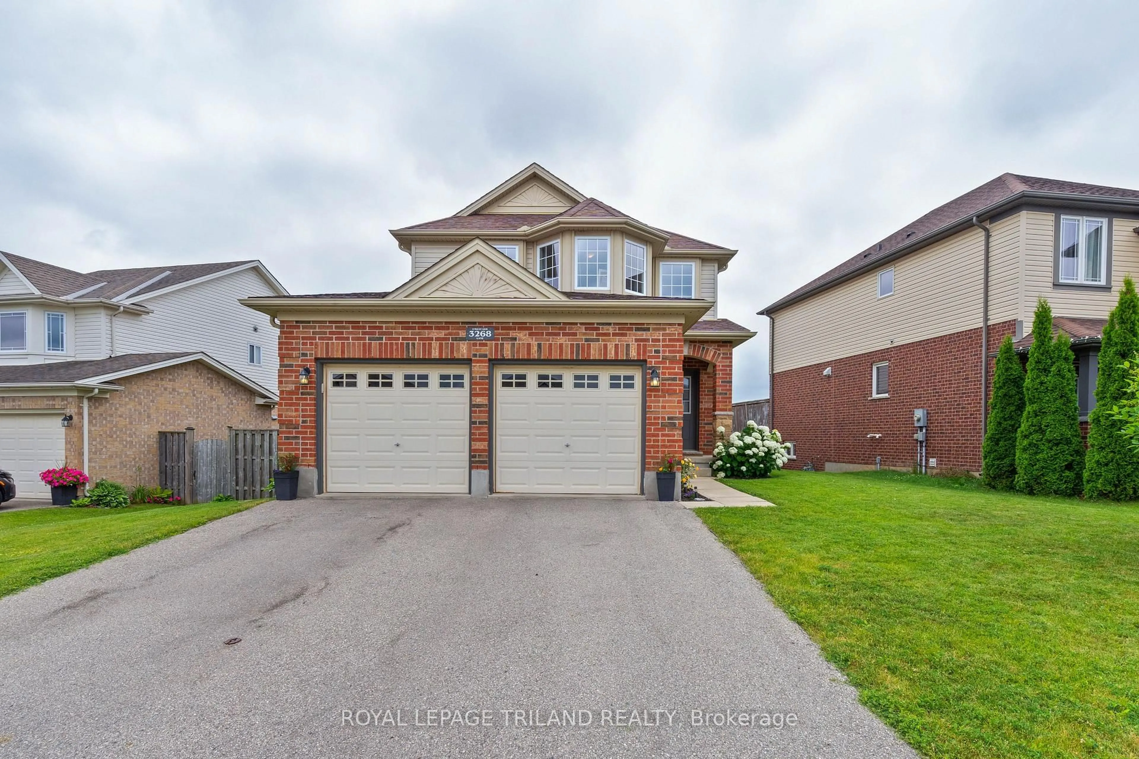 Home with brick exterior material, street for 3268 Emilycarr Lane, London South Ontario N6L 0B2