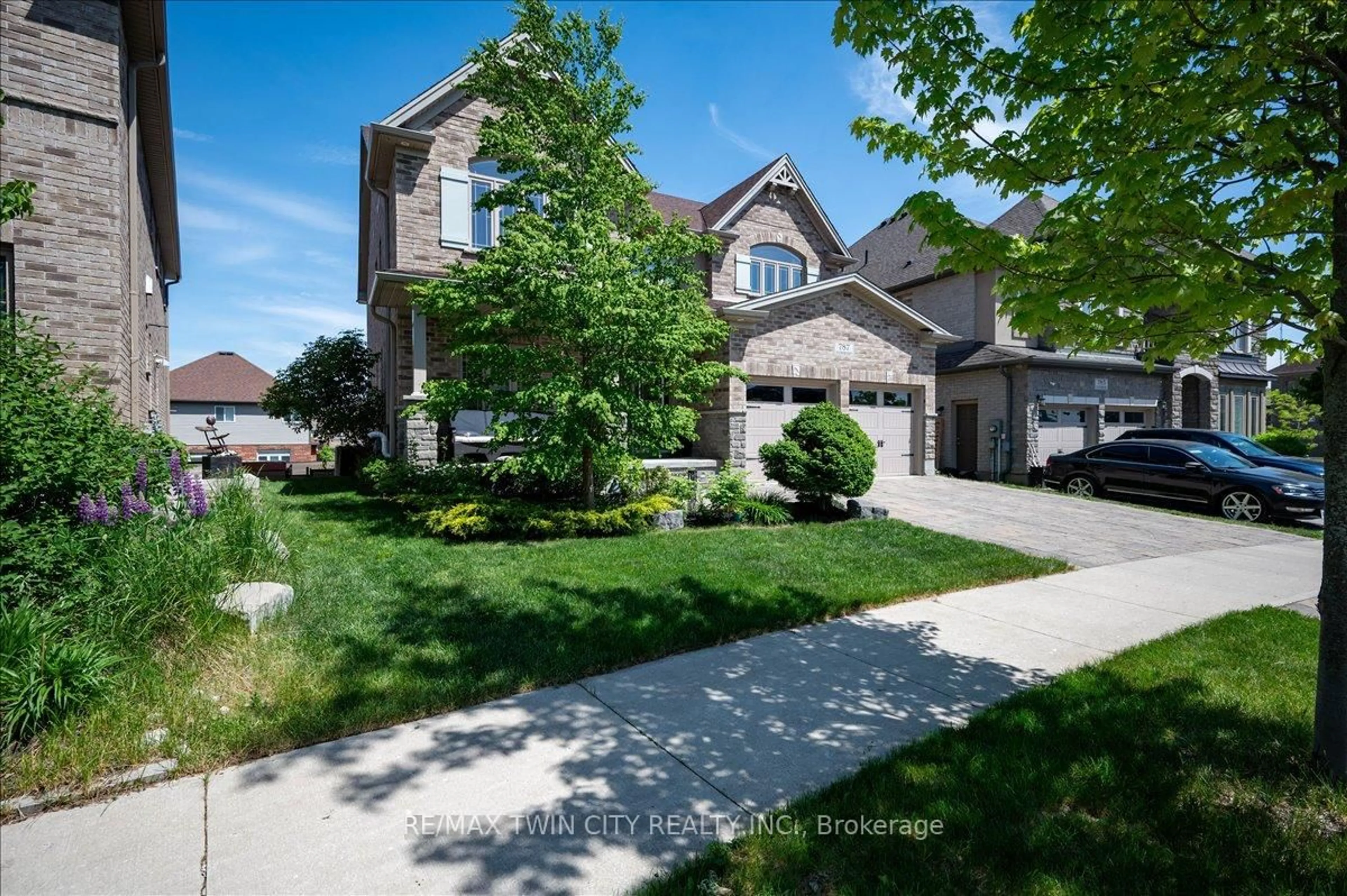 Home with brick exterior material, street for 787 Snowberry Crt, Waterloo Ontario N2V 0E7