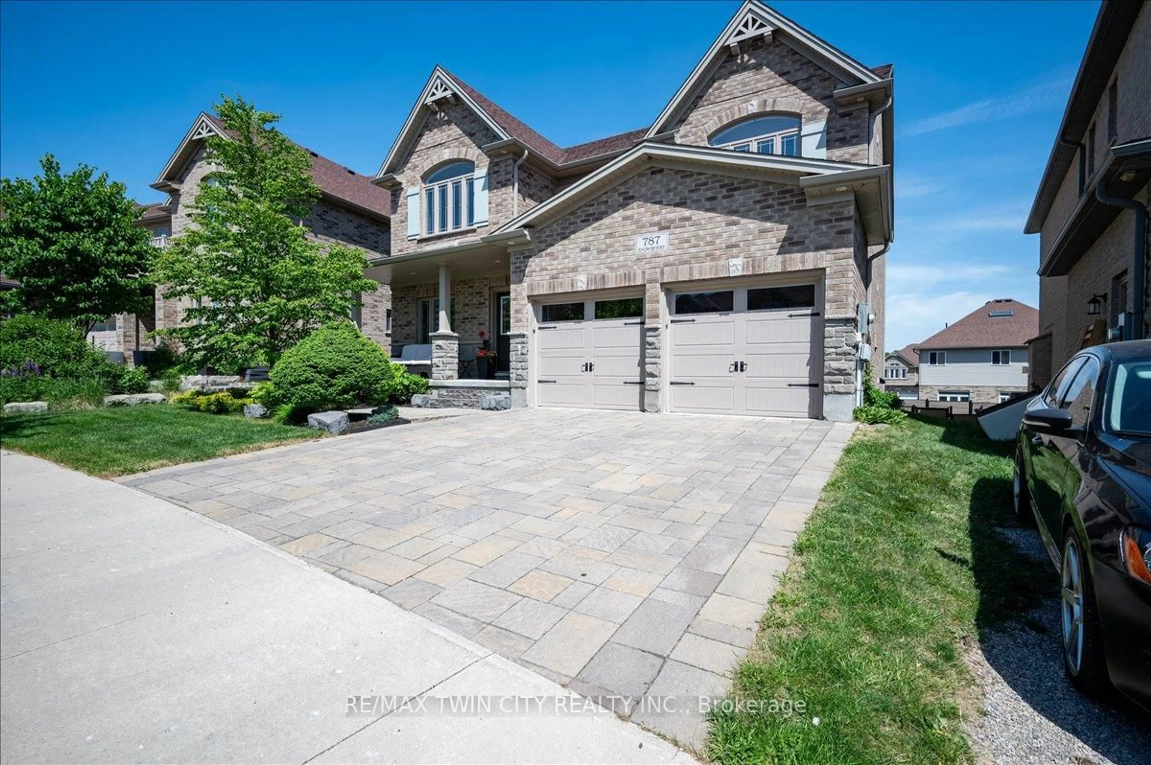 Home with brick exterior material, street for 787 Snowberry Crt, Waterloo Ontario N2V 0E7