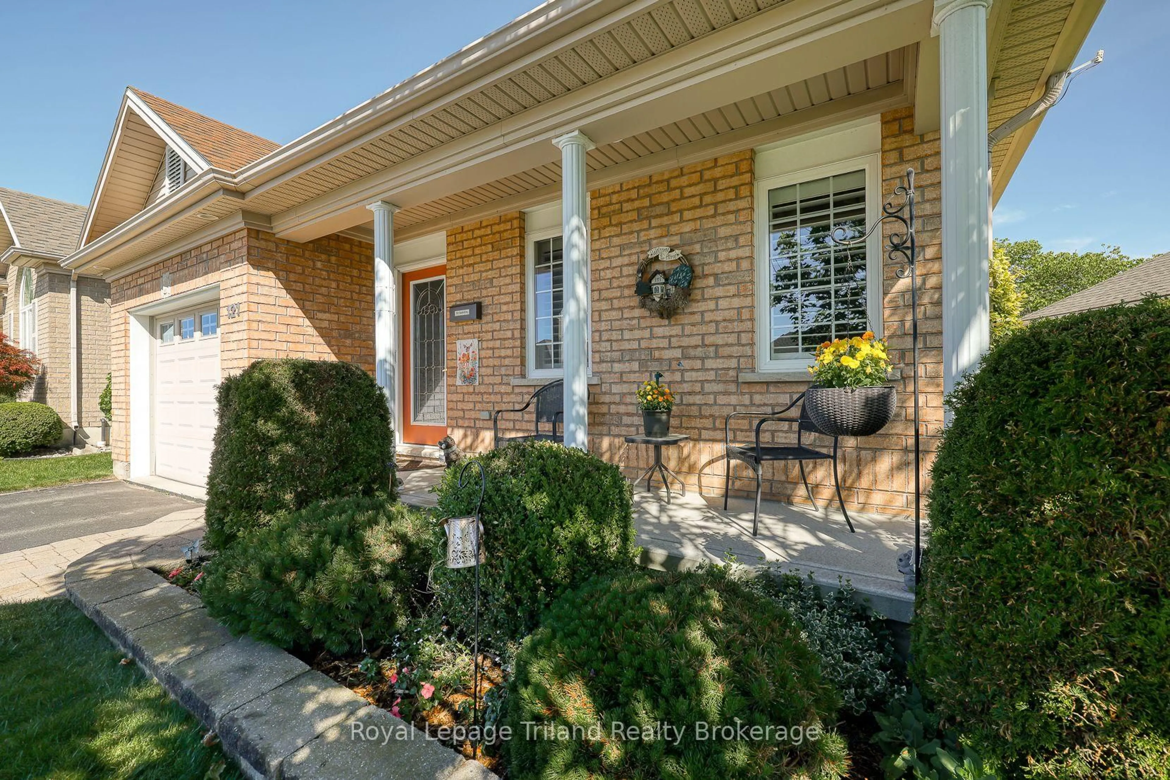 Home with brick exterior material, street for 121 Weston Dr, Tillsonburg Ontario N4G 5X1