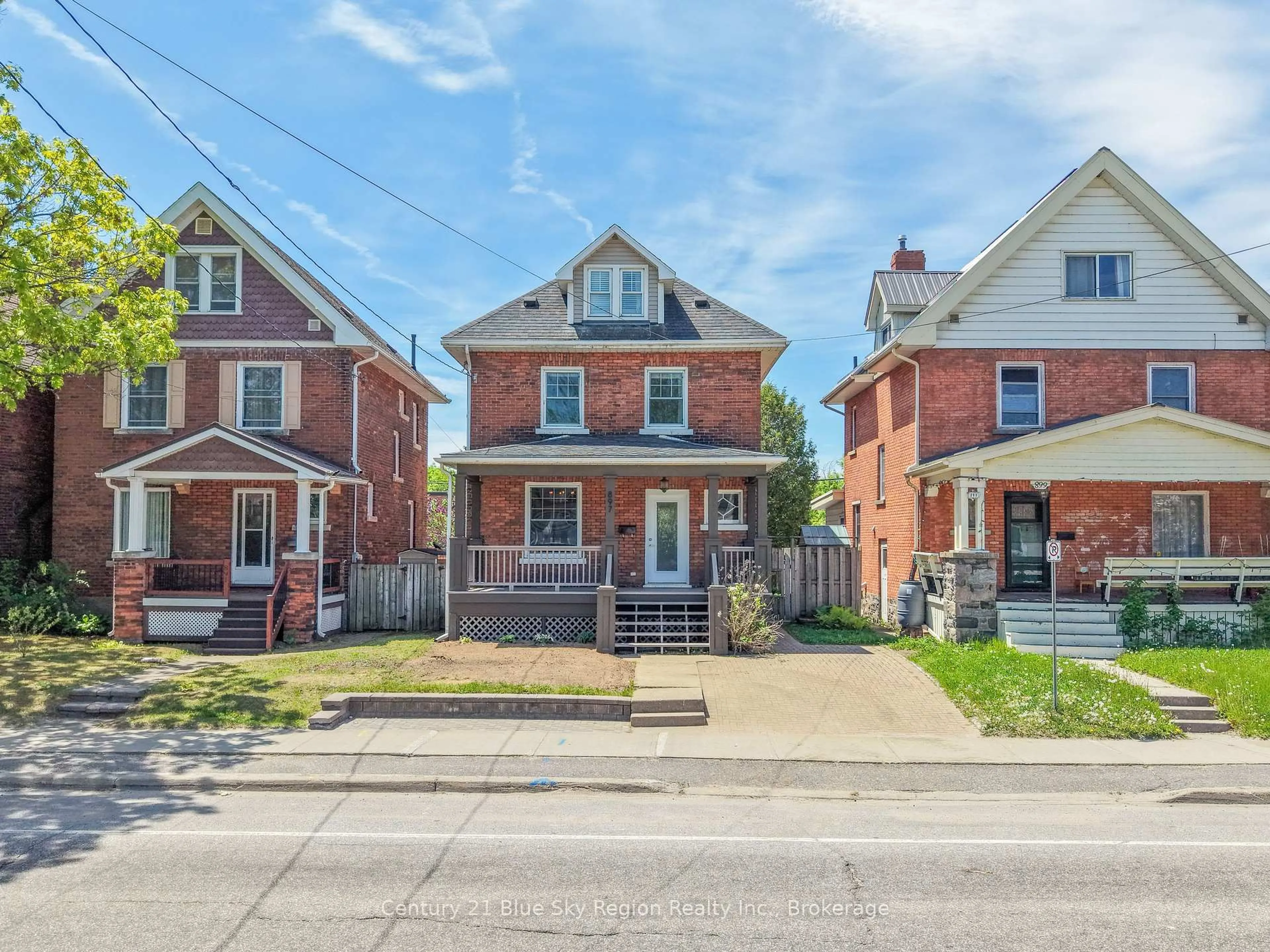 Home with brick exterior material, street for 897 Main St, North Bay Ontario P1B 2V8