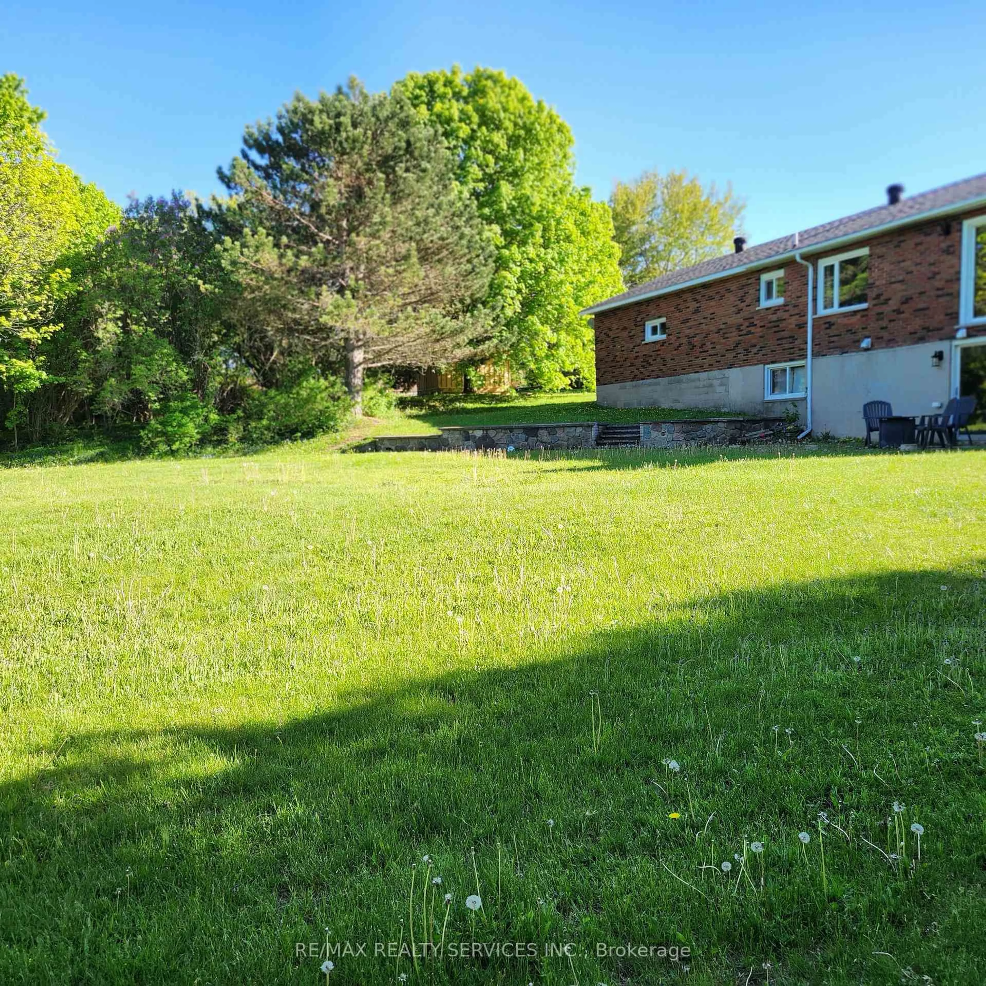 A pic from outside/outdoor area/front of a property/back of a property/a pic from drone, unknown for 1 Helen St, Northern Bruce Peninsula Ontario N0H 1W0