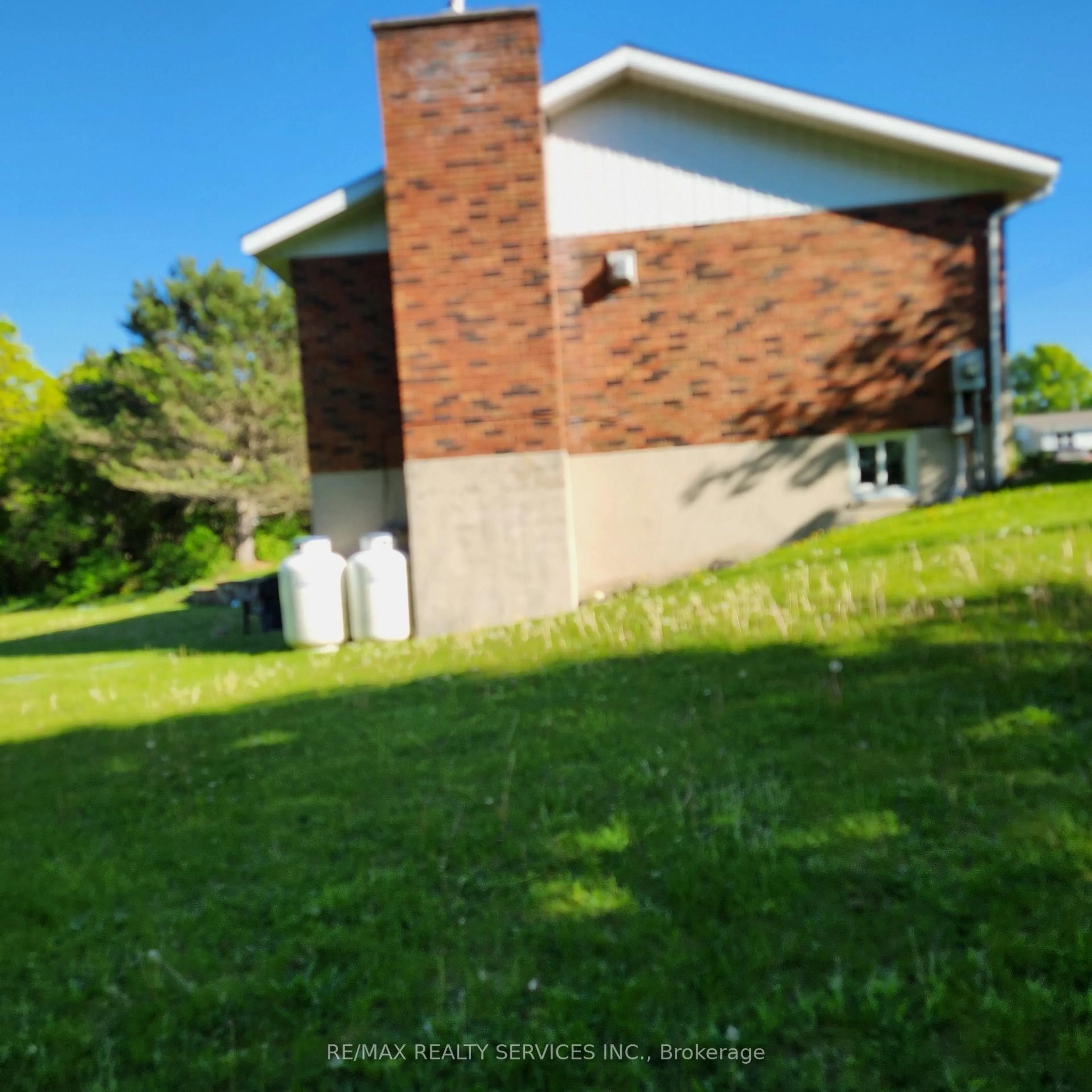 A pic from outside/outdoor area/front of a property/back of a property/a pic from drone, building for 1 Helen St, Northern Bruce Peninsula Ontario N0H 1W0