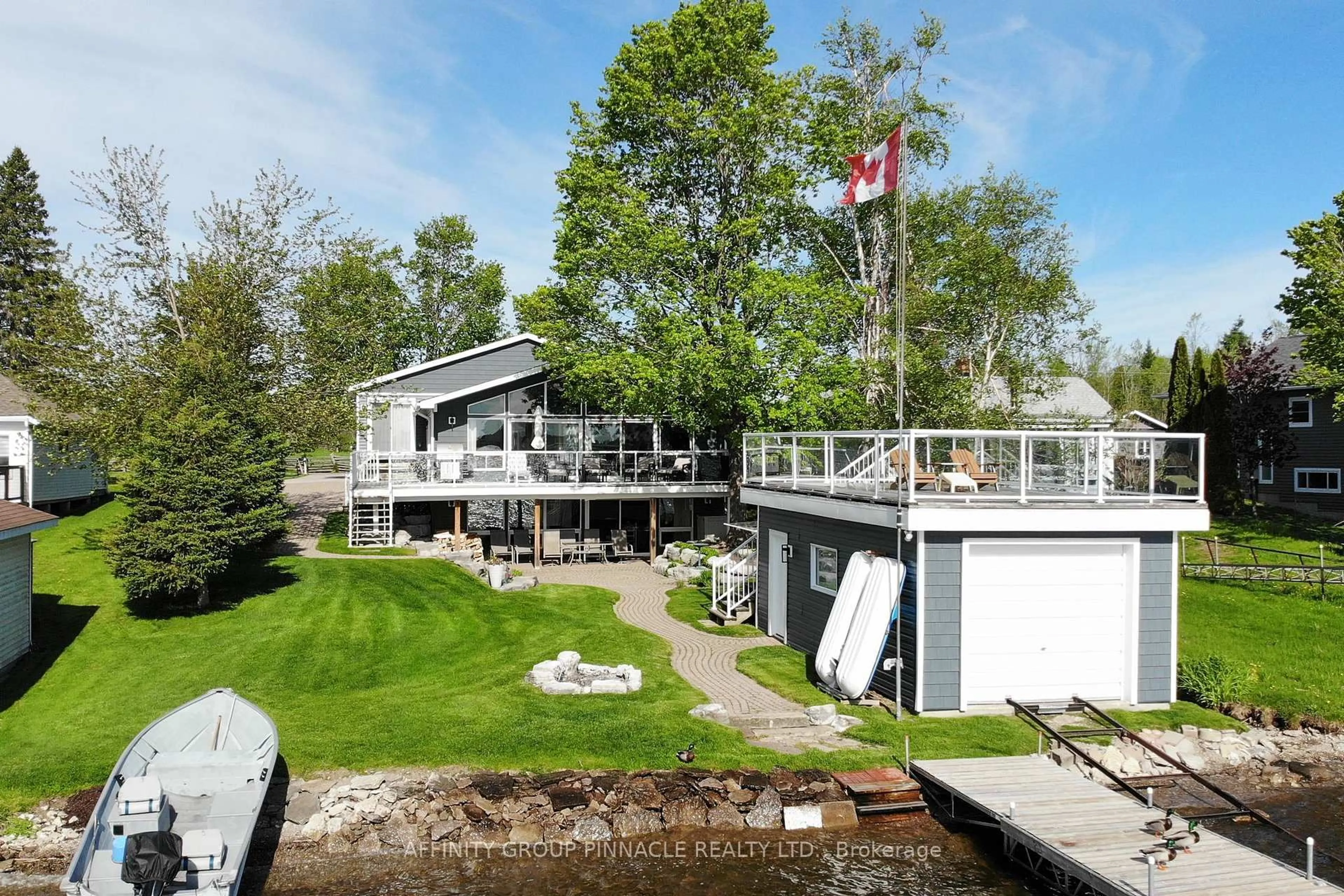 A pic from outside/outdoor area/front of a property/back of a property/a pic from drone, water/lake/river/ocean view for 73 Admiral Dr, Kawartha Lakes Ontario K0M 1G0