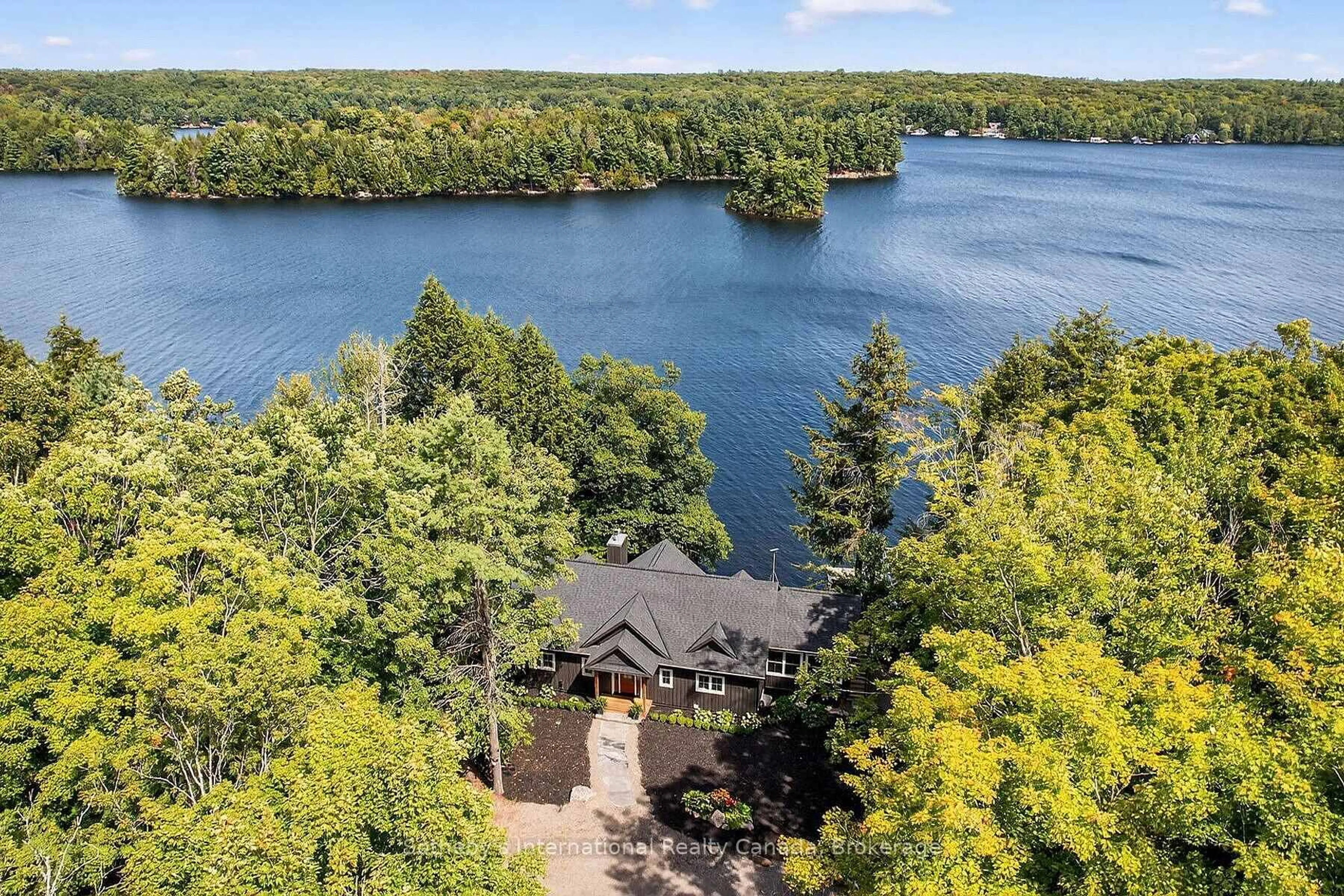 A pic from outside/outdoor area/front of a property/back of a property/a pic from drone, water/lake/river/ocean view for 1160 Whiteside Rd #52, Muskoka Lakes Ontario P0B 1J0