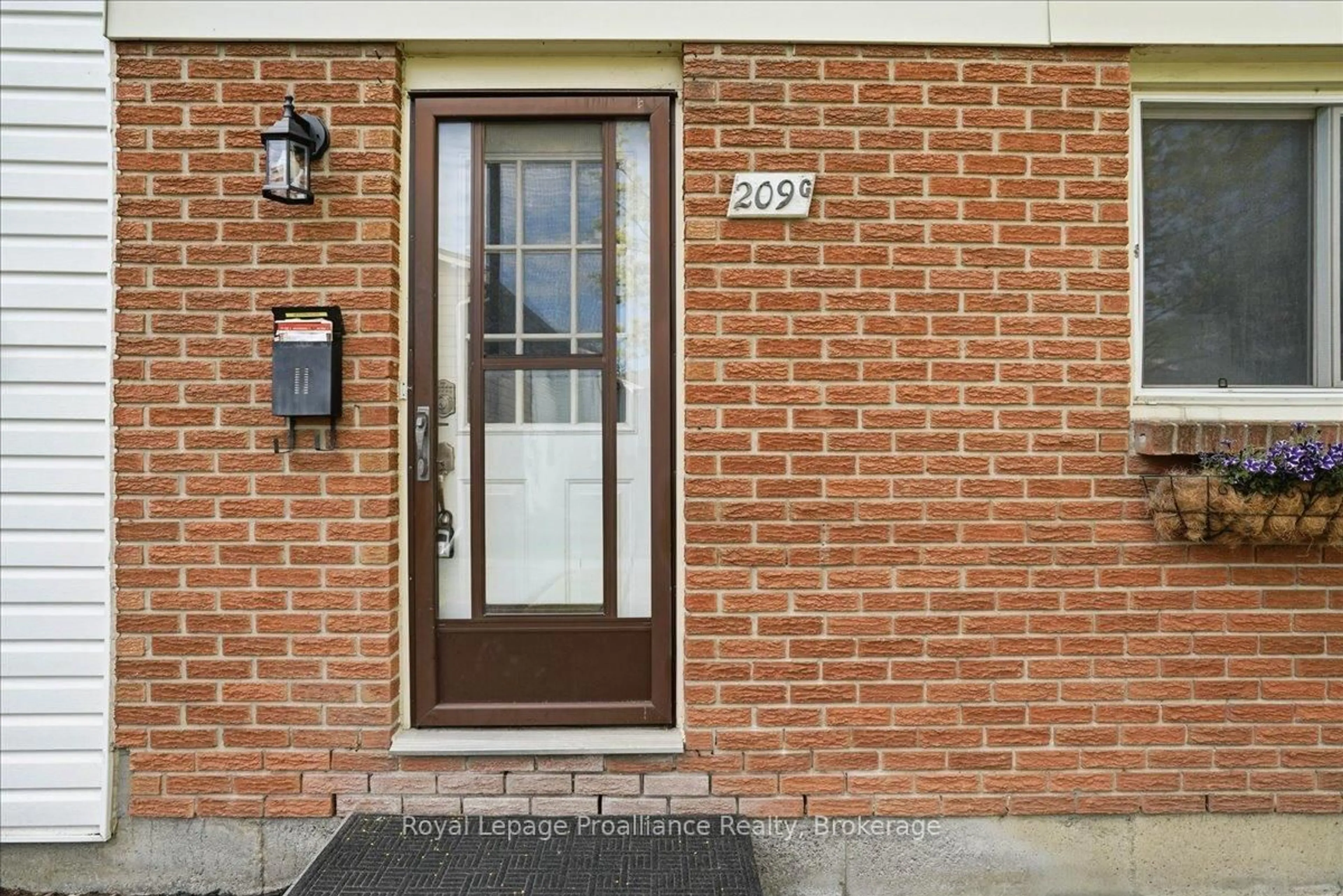 Home with brick exterior material, street for 209 North Park St #G, Belleville Ontario K8P 4T9