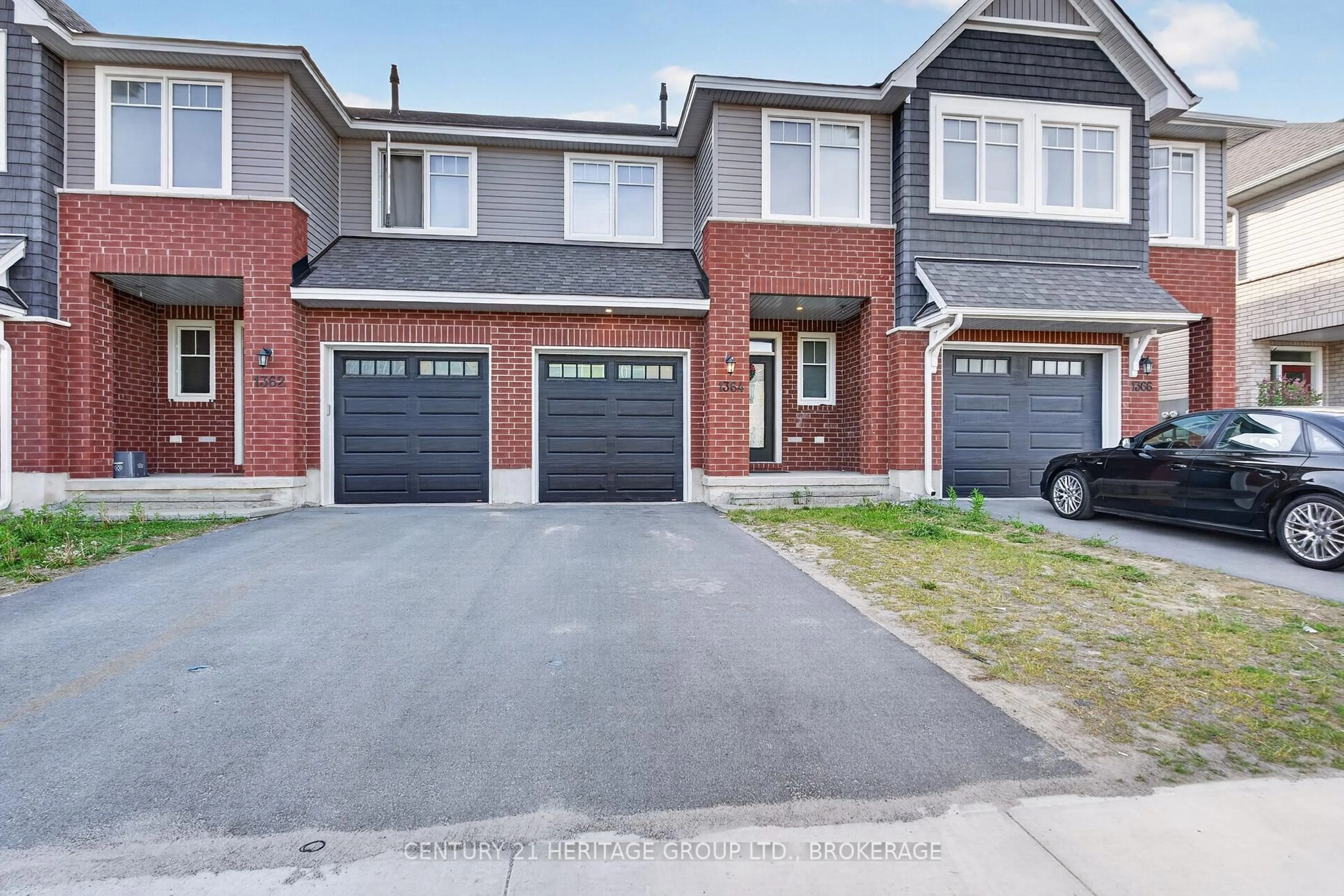 Home with brick exterior material, street for 1364 Demers Ave, Kingston Ontario K7M 0H7