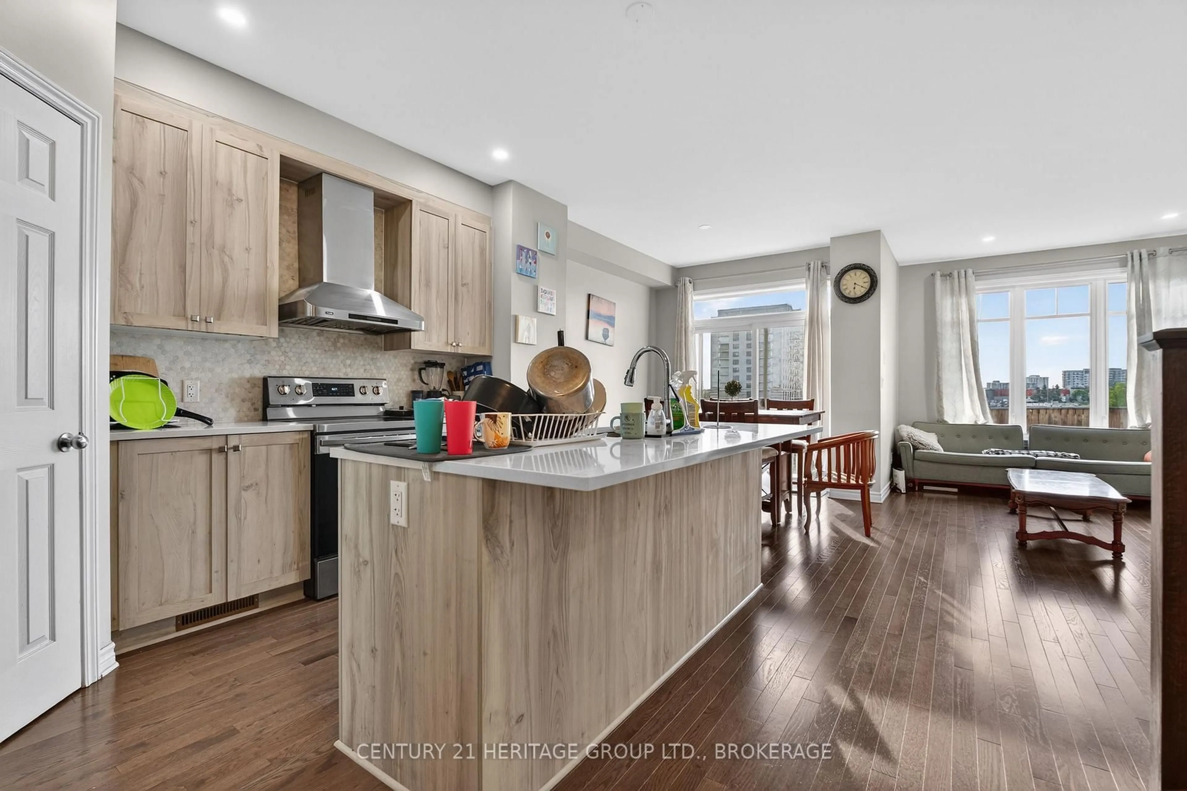 Open concept kitchen, wood/laminate floor for 1364 Demers Ave, Kingston Ontario K7M 0H7