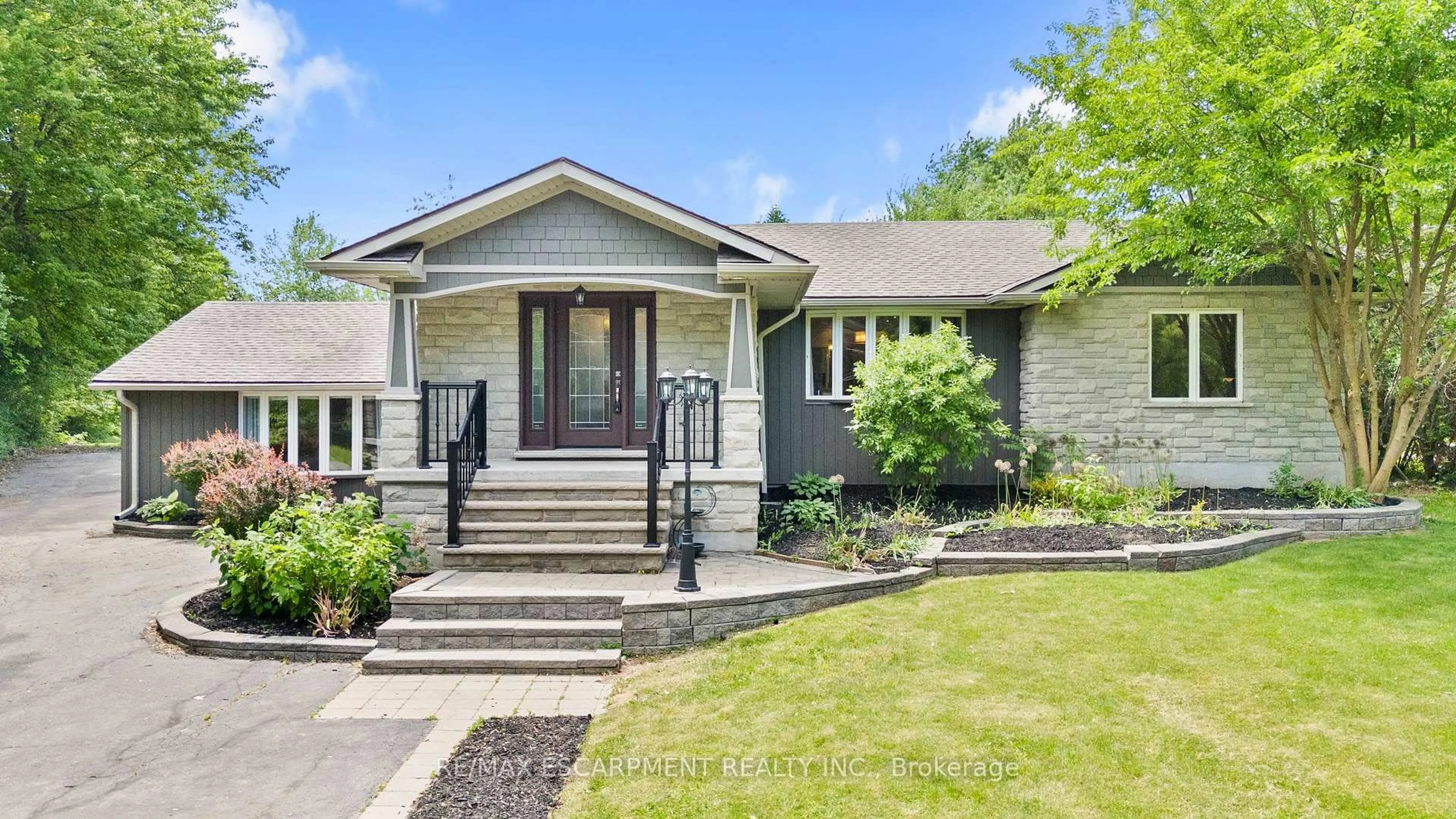Home with brick exterior material, street for 404 Hamilton Dr, Hamilton Ontario L9G 2B1