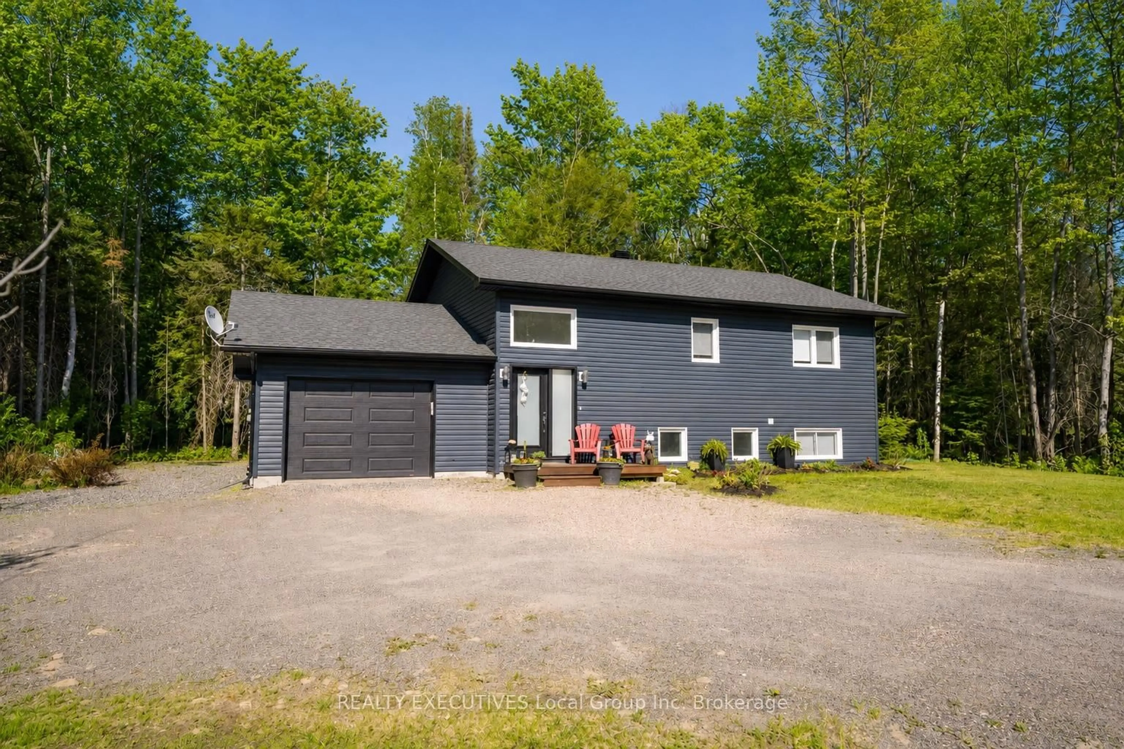 Home with vinyl exterior material, street for 61 Astor St, East Ferris Ontario P0H 1B0