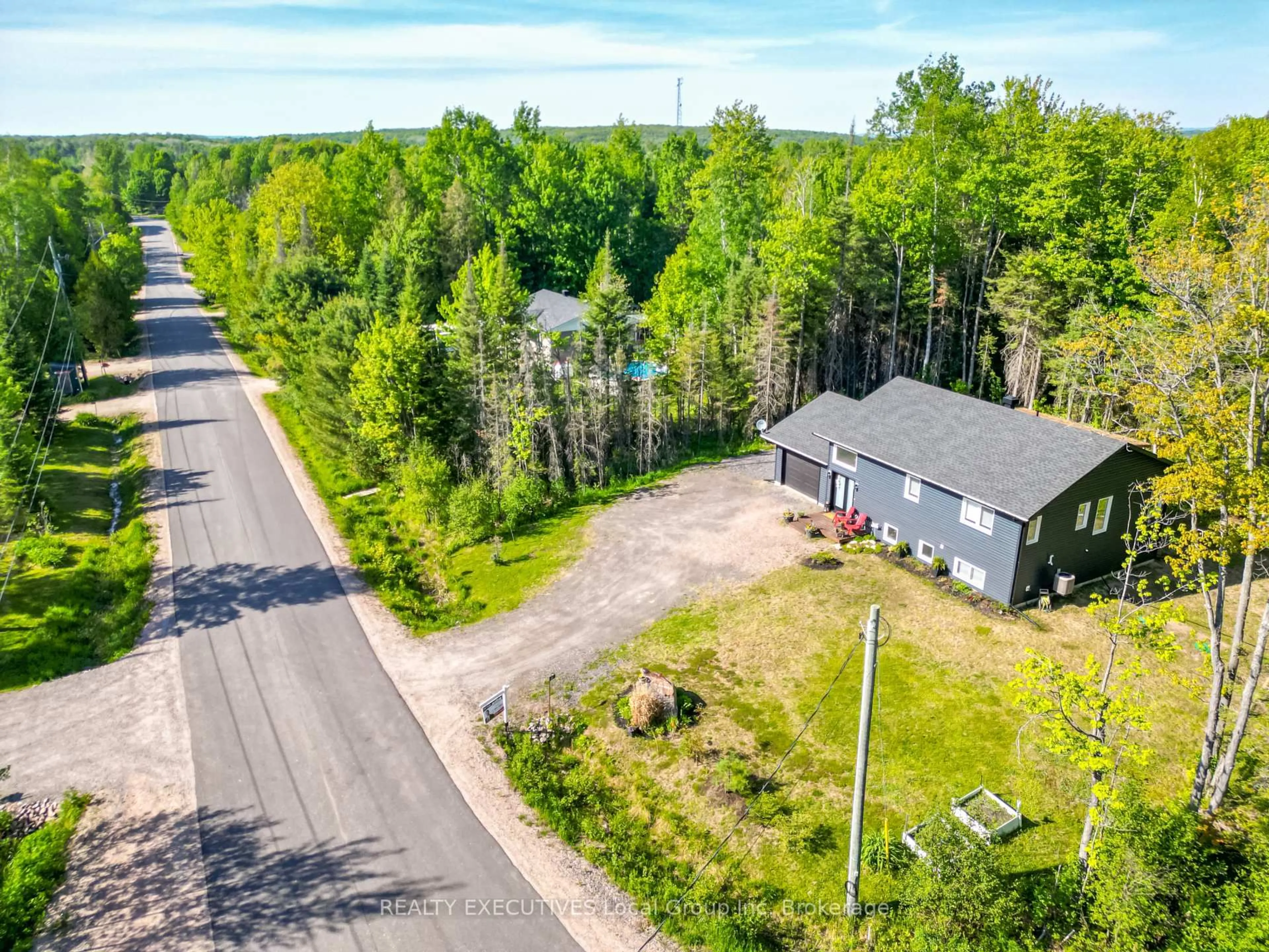 A pic from outside/outdoor area/front of a property/back of a property/a pic from drone, unknown for 61 Astor St, East Ferris Ontario P0H 1B0