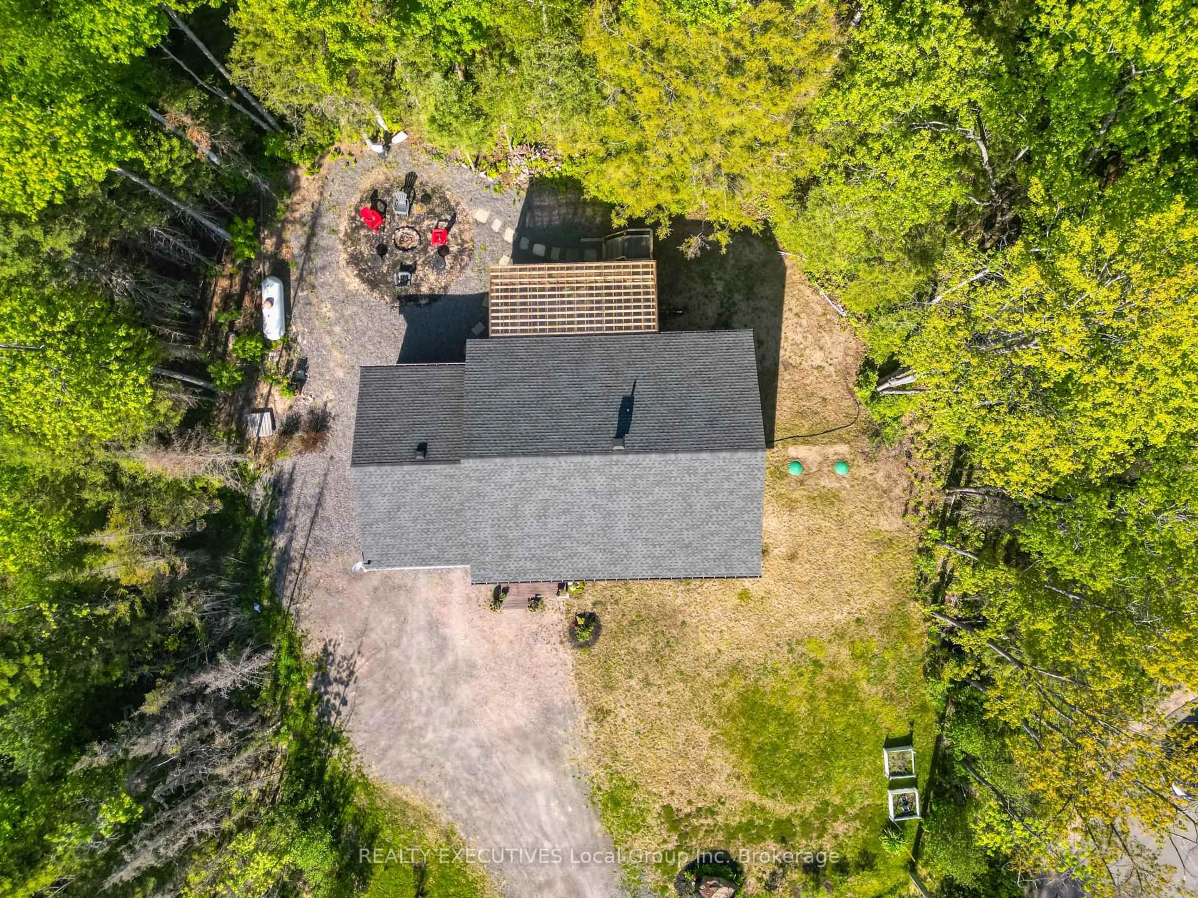 A pic from outside/outdoor area/front of a property/back of a property/a pic from drone, unknown for 61 Astor St, East Ferris Ontario P0H 1B0