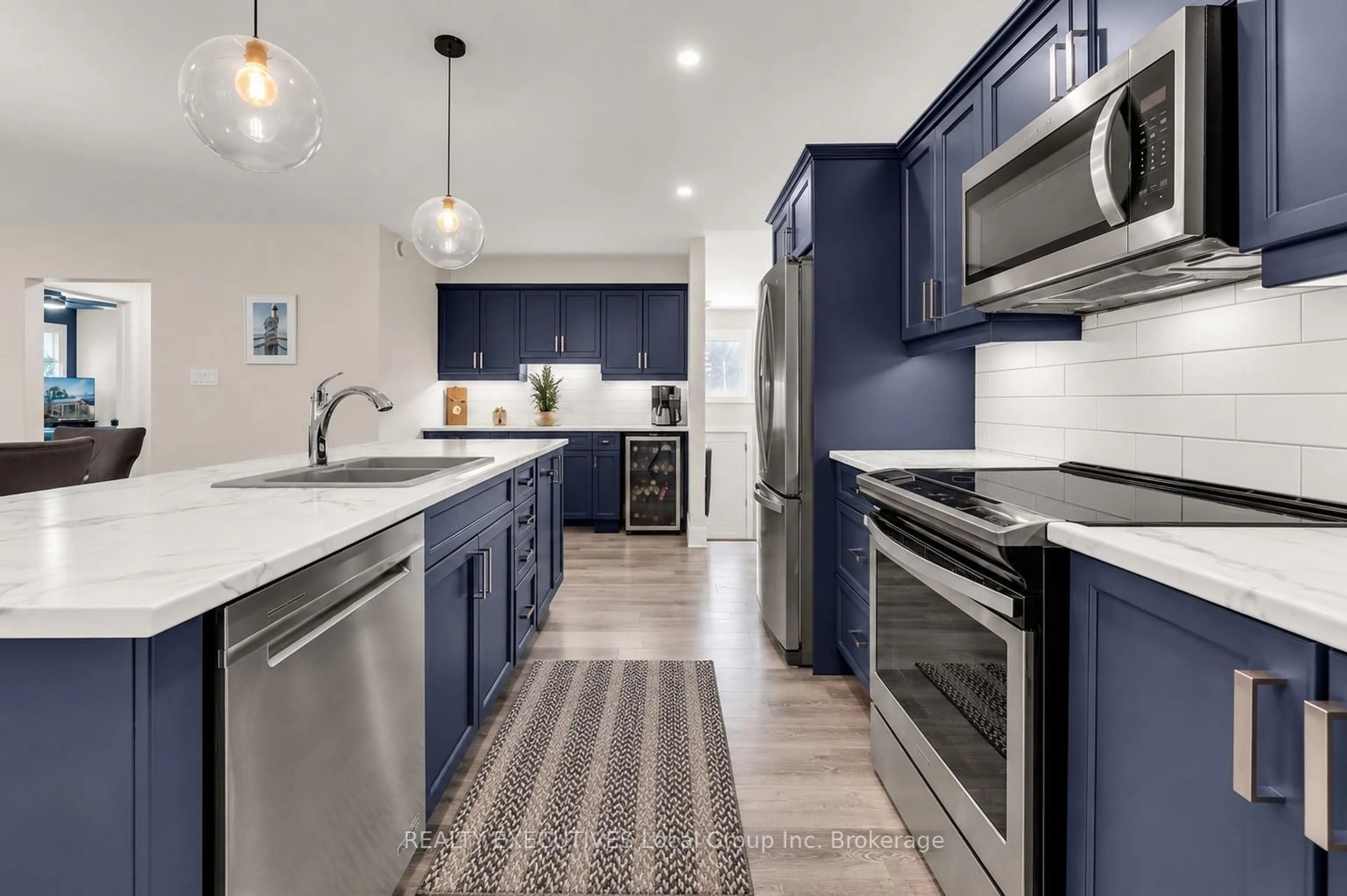 Open concept kitchen, ceramic/tile floor for 61 Astor St, East Ferris Ontario P0H 1B0