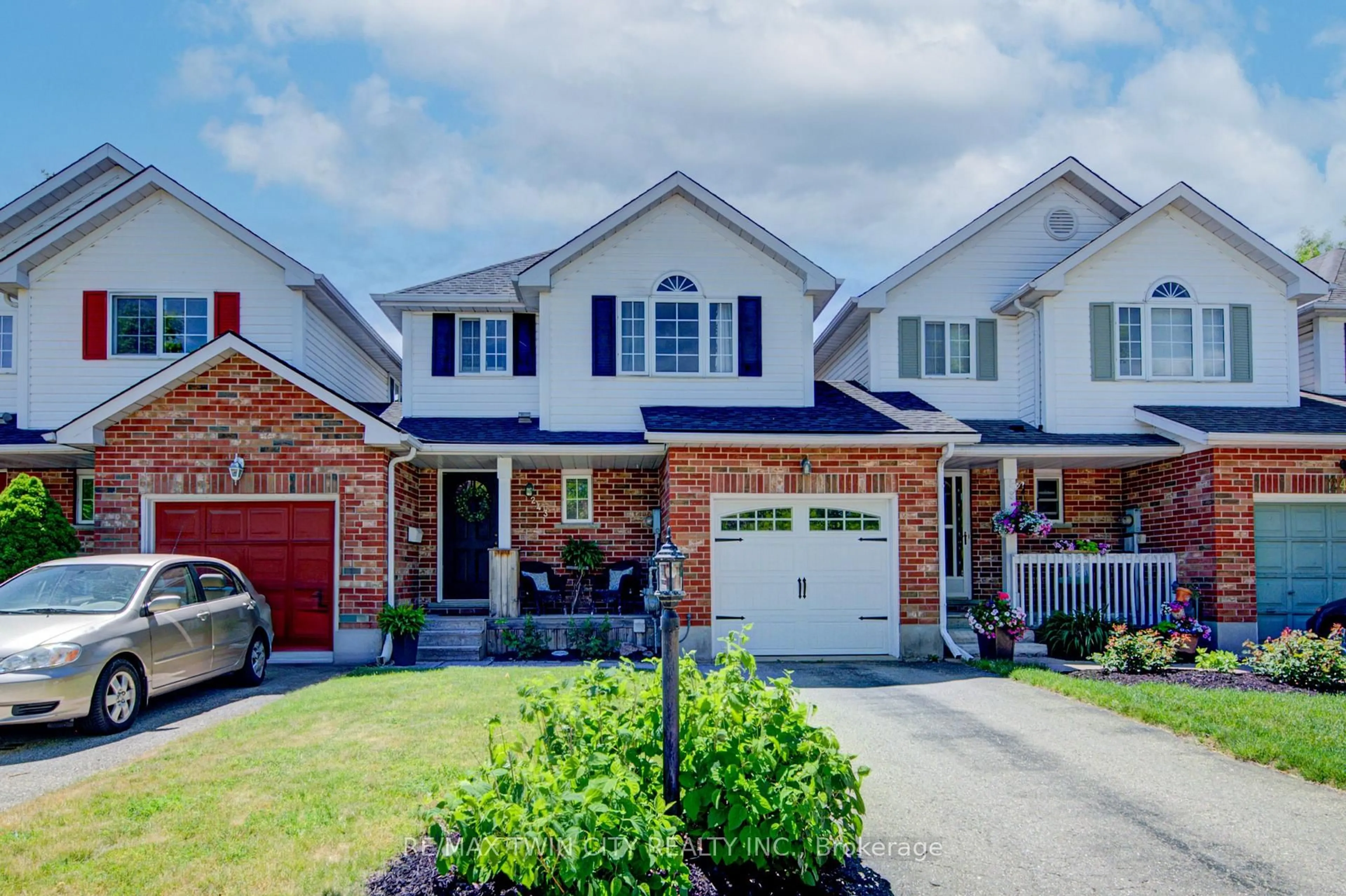 Home with brick exterior material, street for 243 Auburn Dr, Waterloo Ontario N2K 3X7