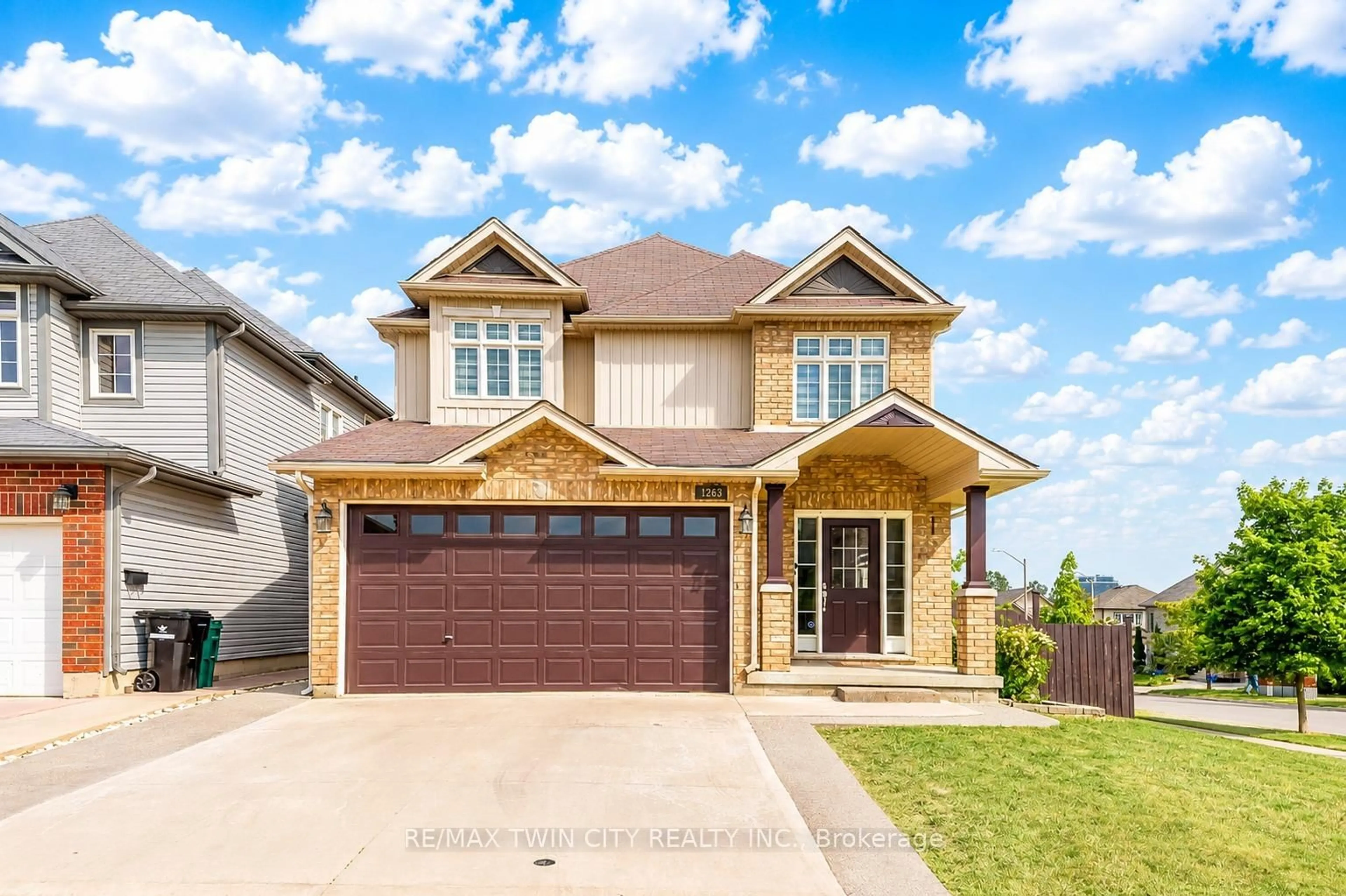Home with brick exterior material, street for 1263 Countrystone Dr, Kitchener Ontario N2N 3S4