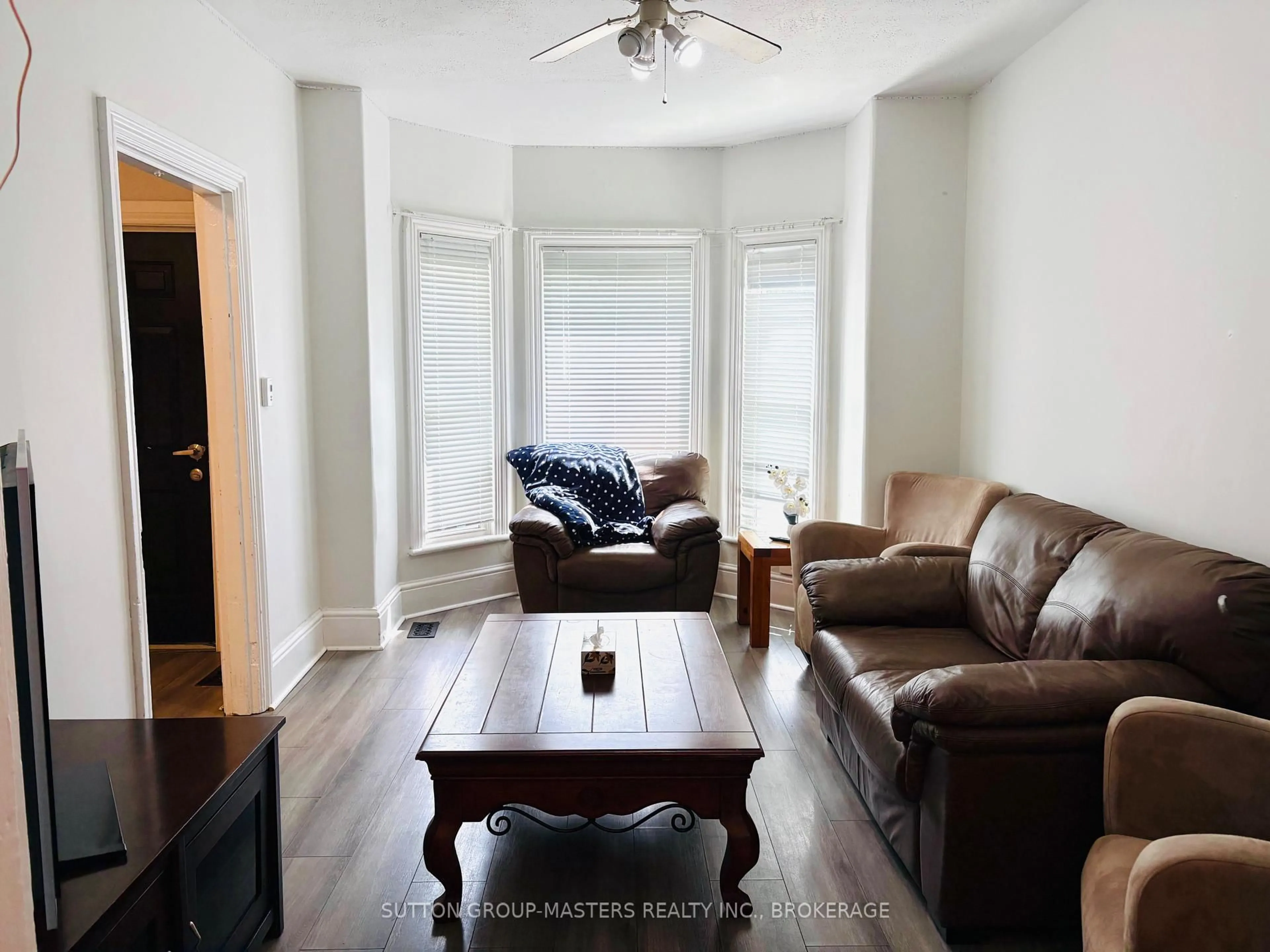 Living room with furniture, wood/laminate floor for 378 Barrie St, Kingston Ontario K7K 3T4