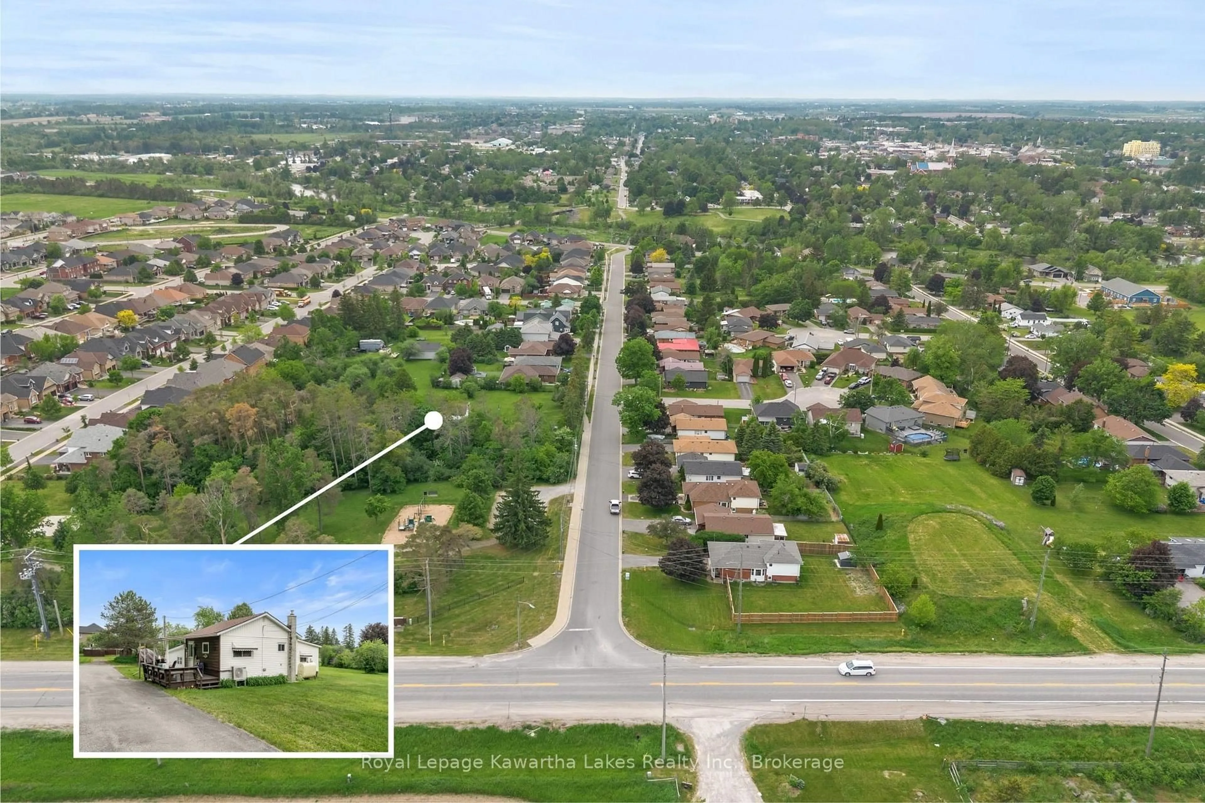 A pic from outside/outdoor area/front of a property/back of a property/a pic from drone, street for 55 Parkside Dr, Kawartha Lakes Ontario K9V 5Y1