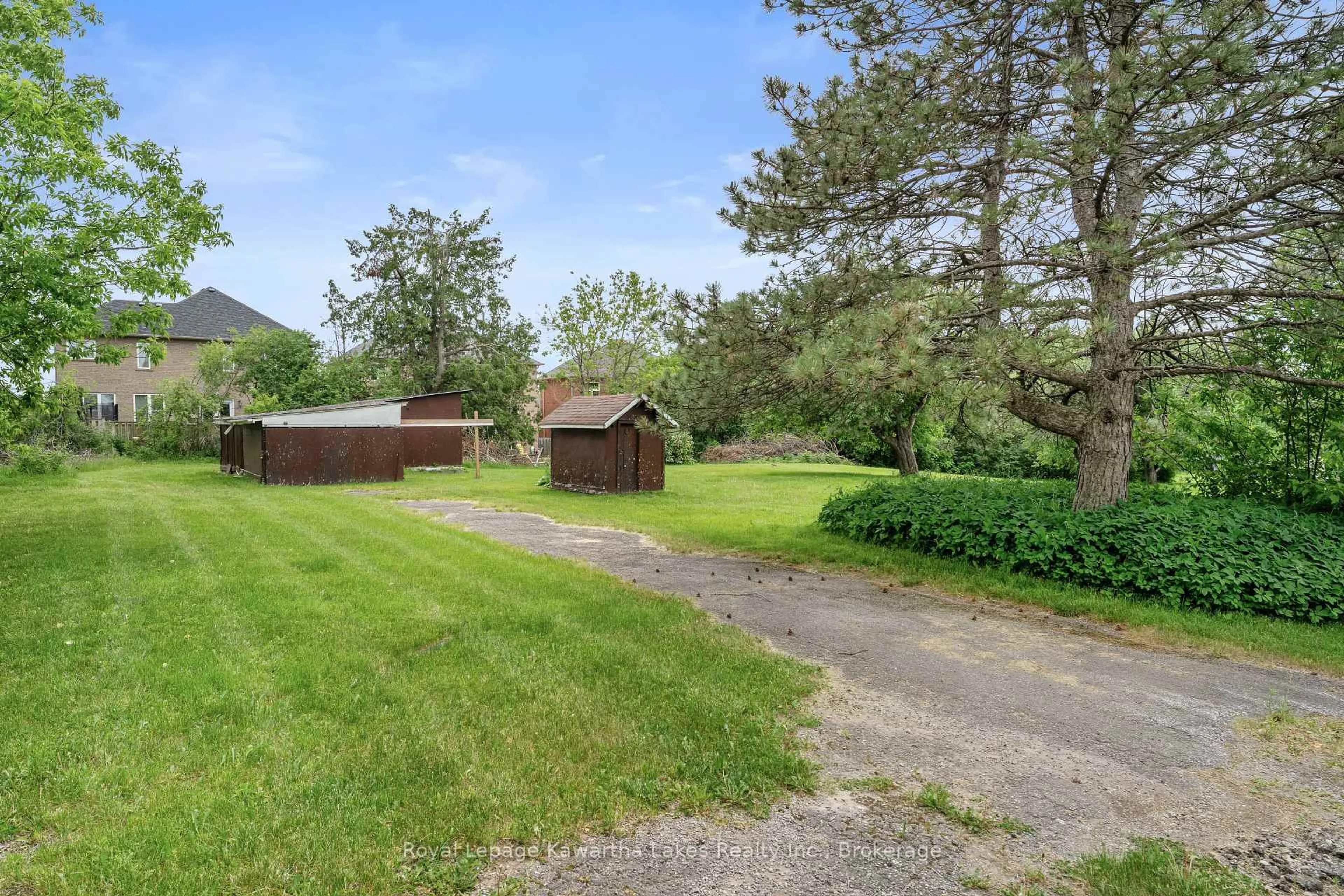A pic from outside/outdoor area/front of a property/back of a property/a pic from drone, water/lake/river/ocean view for 55 Parkside Dr, Kawartha Lakes Ontario K9V 5Y1