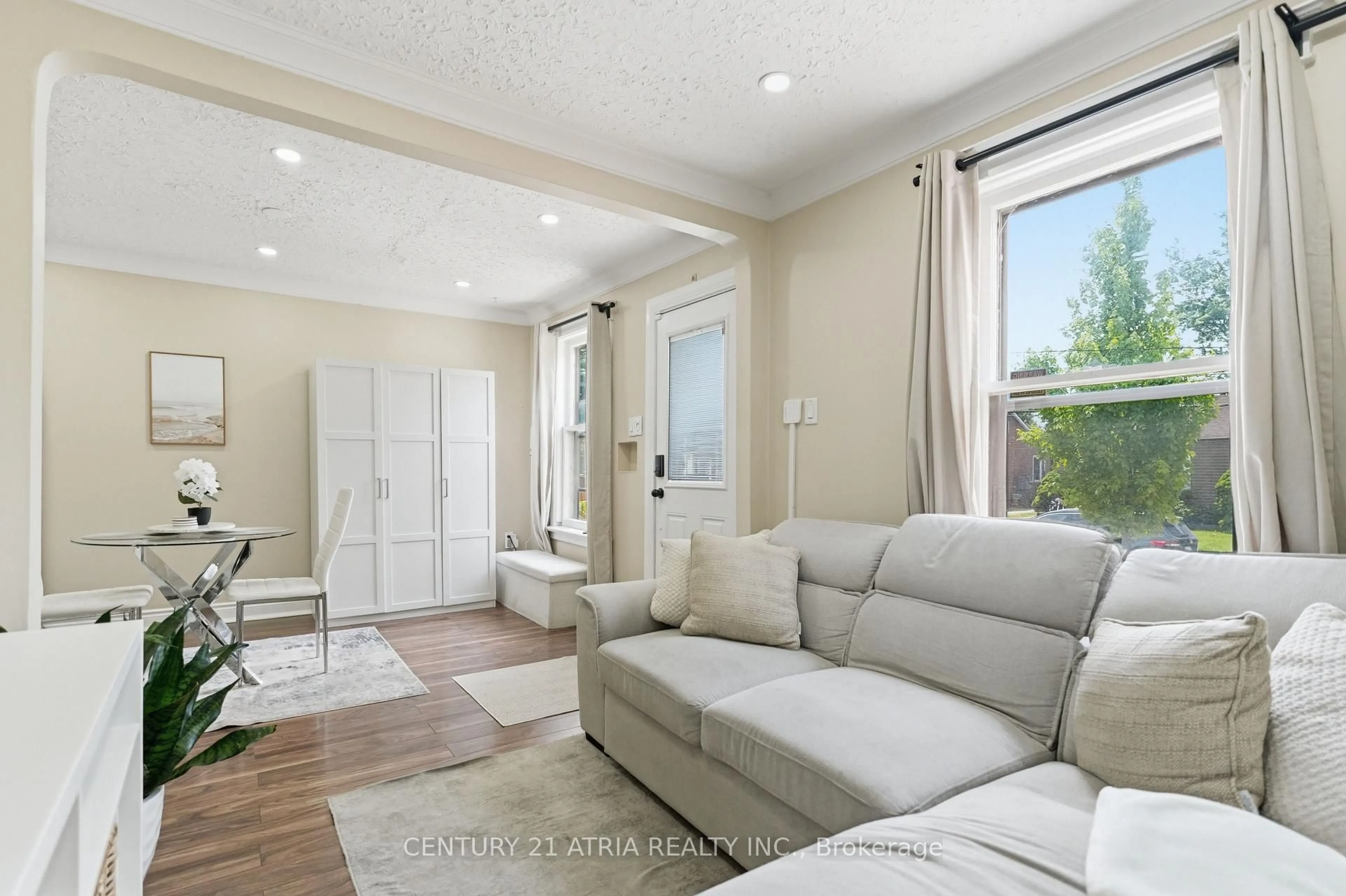 Living room with furniture, ceramic/tile floor for 141 Mcanulty Blvd, Hamilton Ontario L8H 3H6